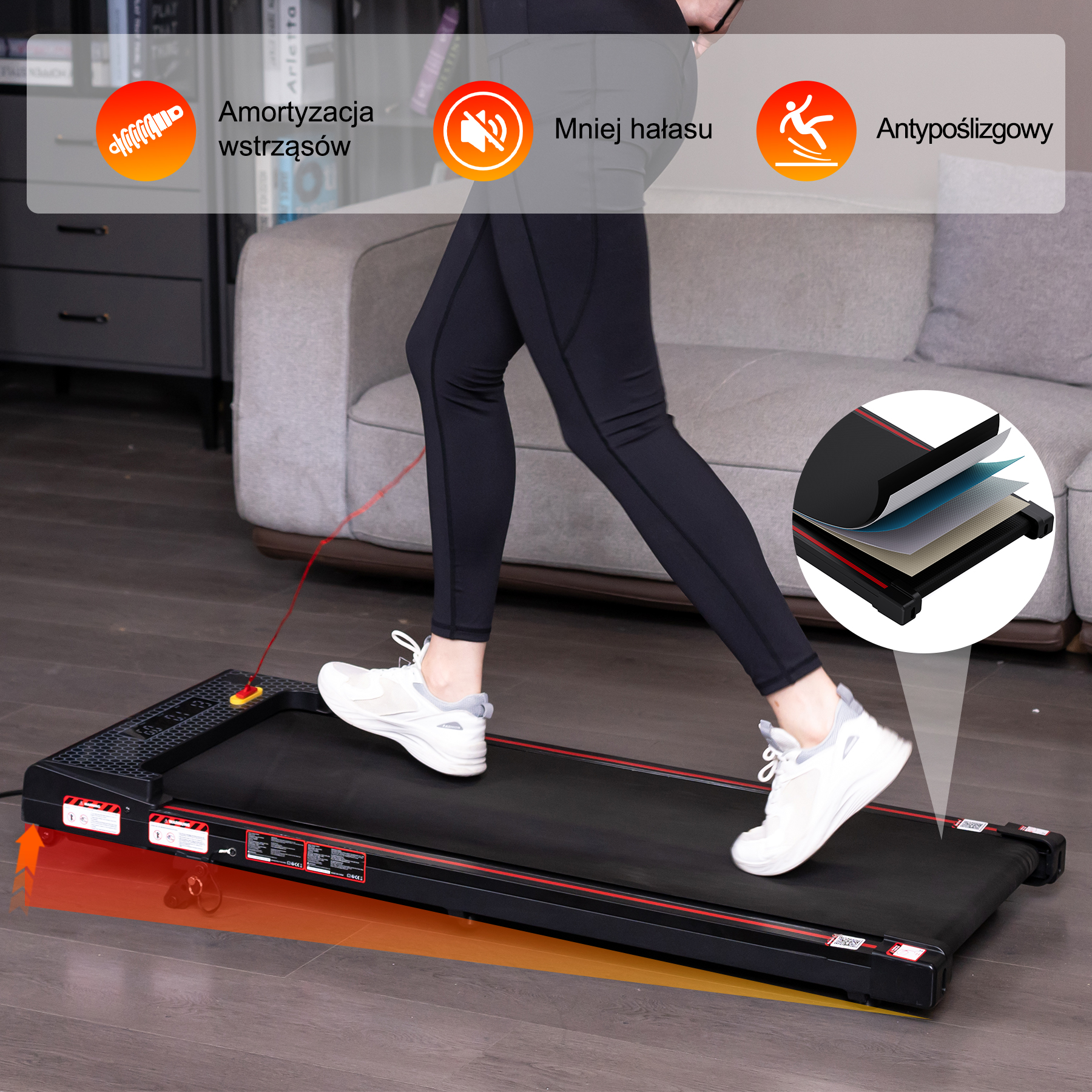 Osoba biegnie na wąskiej bieżni w salonie, z ikonami amortyzacji wstrząsów.