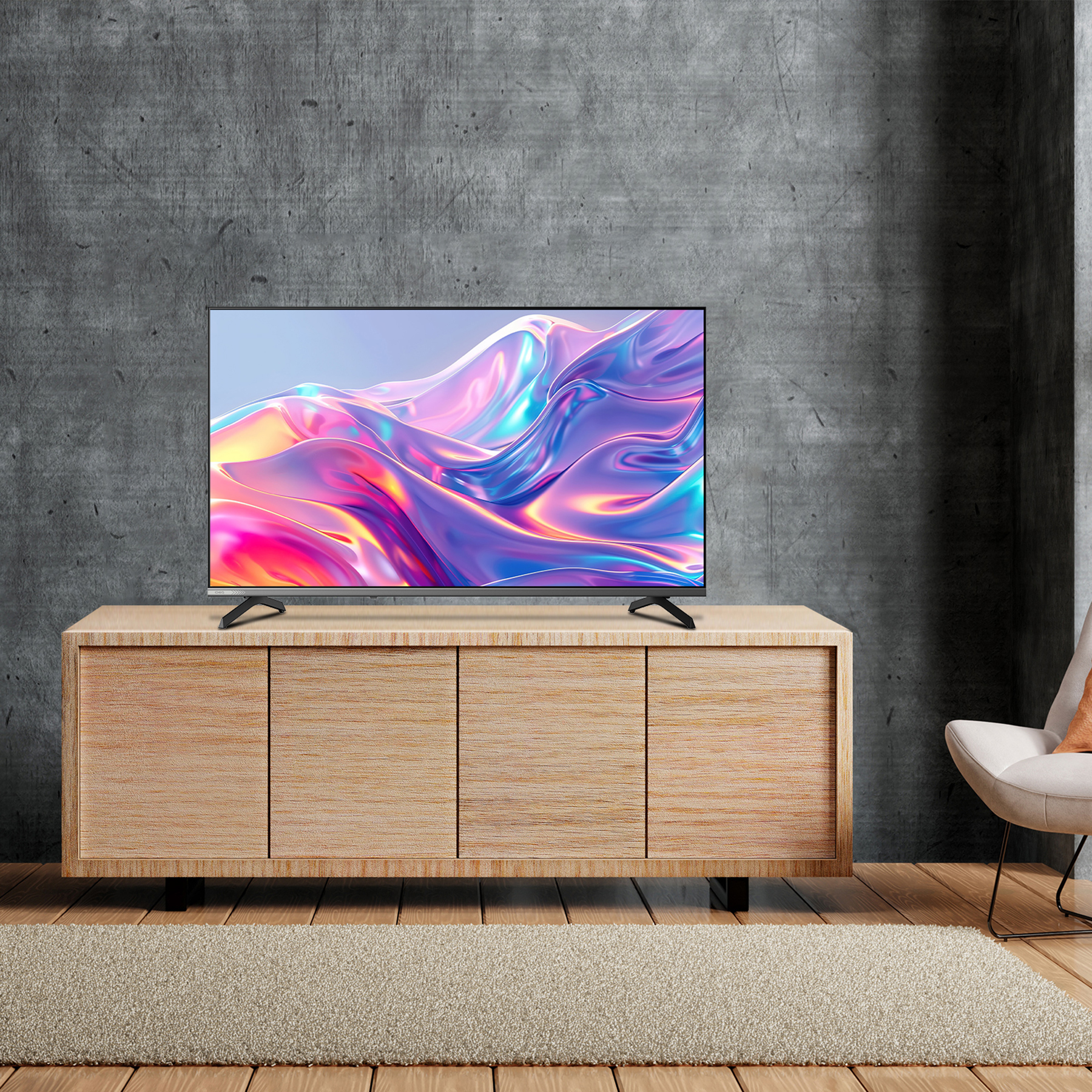 Een moderne televisie staat op een houten kast tegen een betonnen muur.