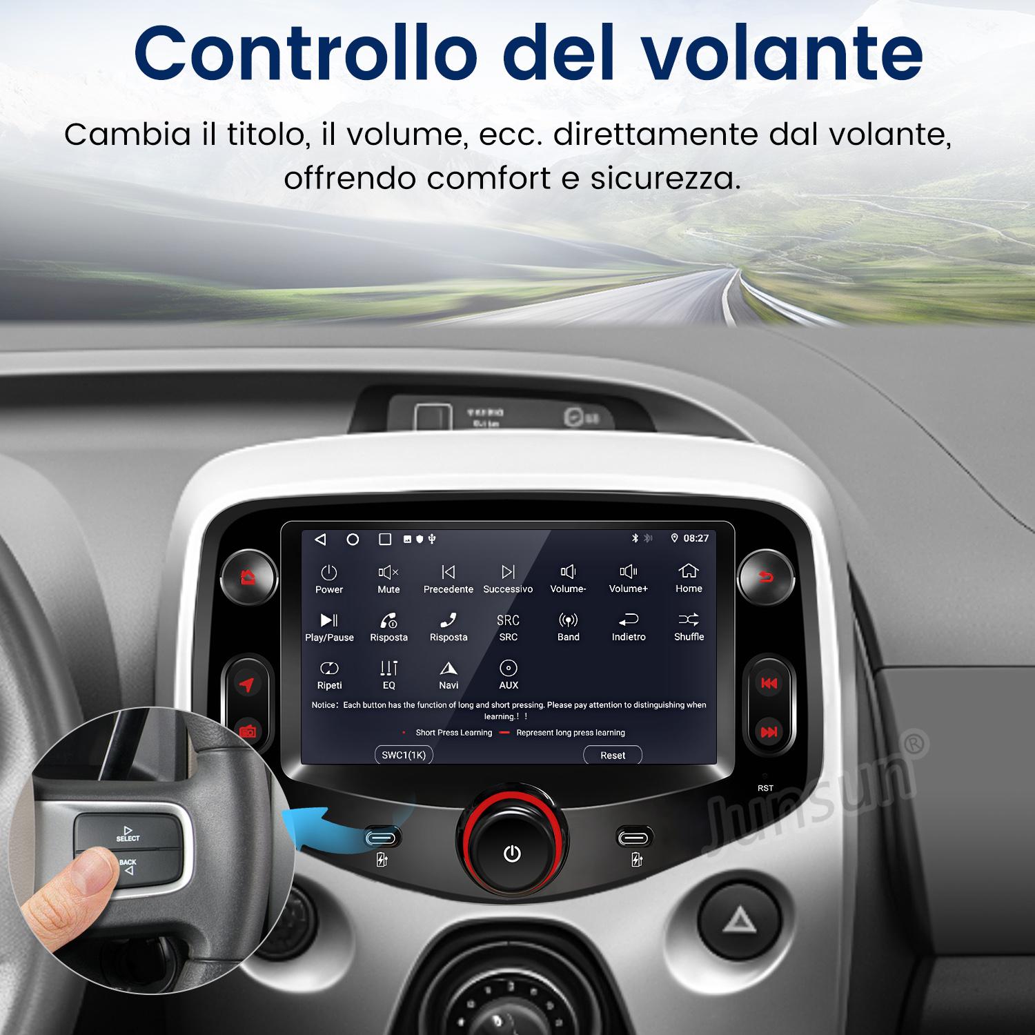 Primo piano del volante e dello schermo infotainment di un'auto.