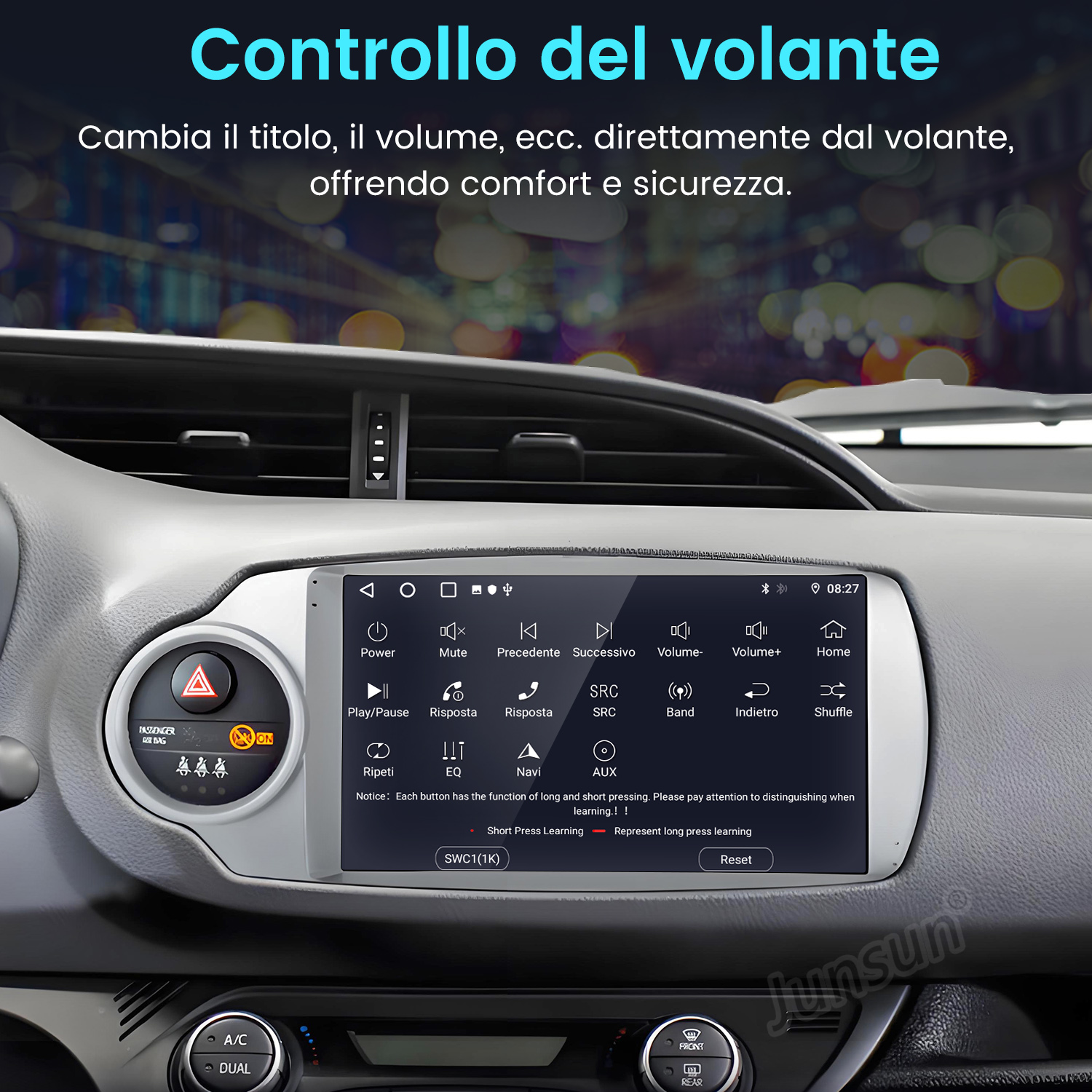 Sistema di infotainment per auto con touchscreen e icone di controllo al volante.