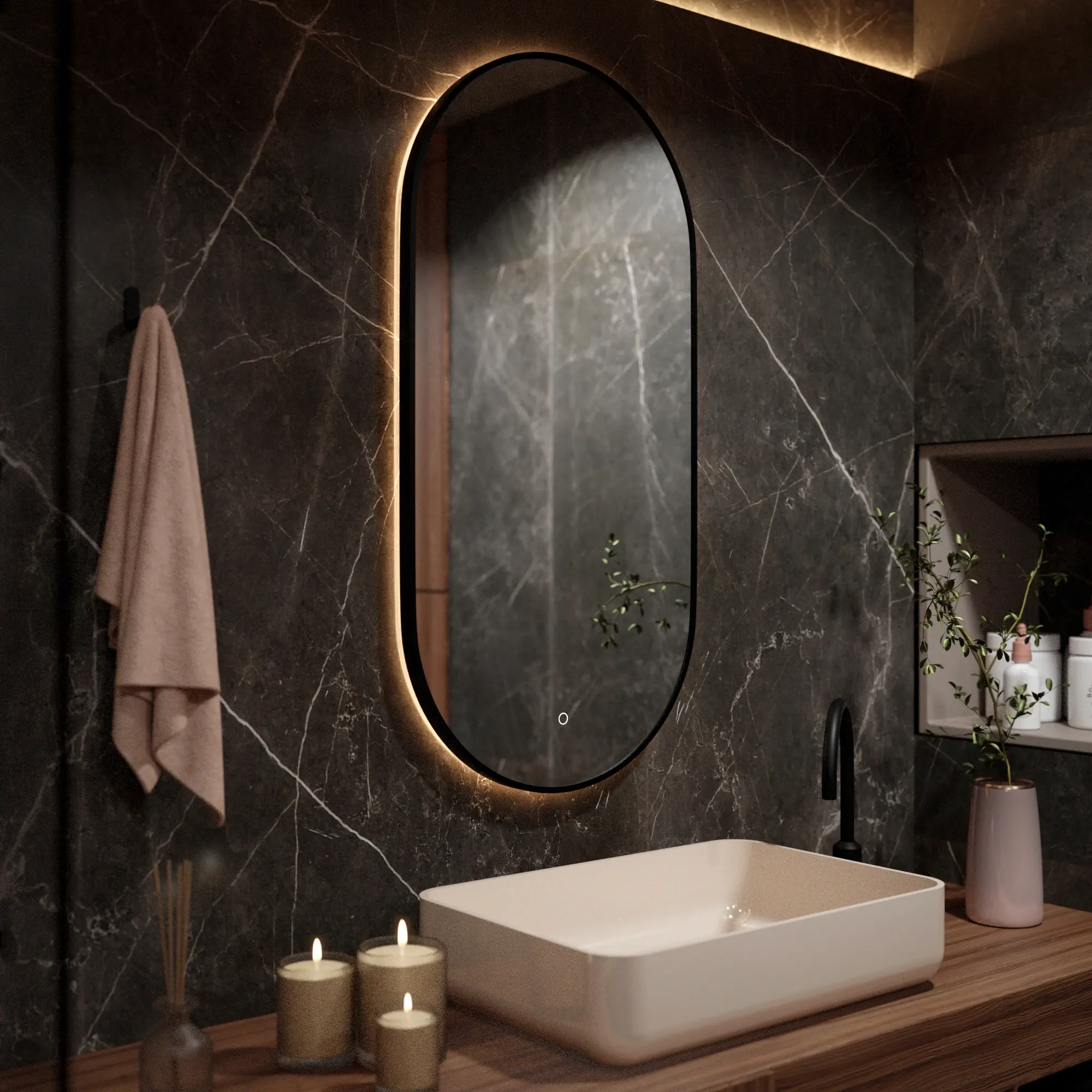A stylish bathroom with marble walls, an oval mirror, and a sink.