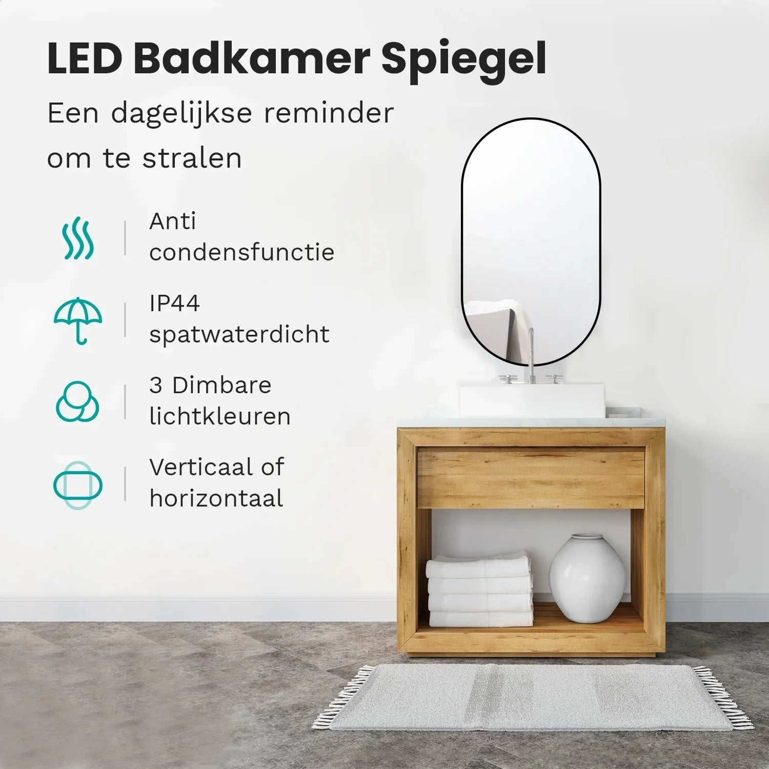Ovale LED badkamerspiegel boven een houten wastafel met handdoeken en vaas.