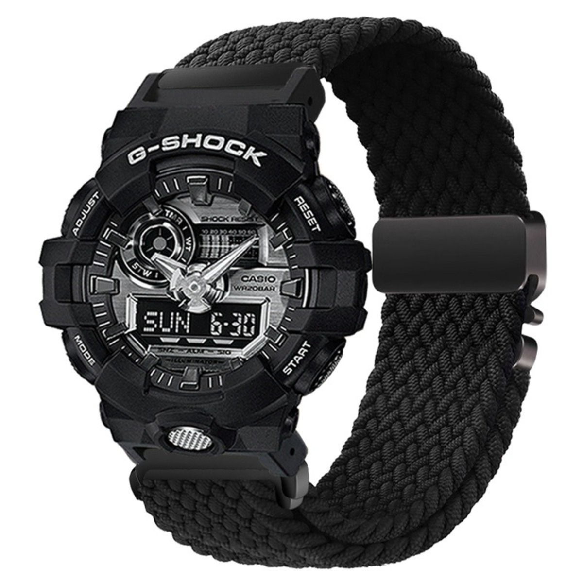 Orologio G-Shock nero con display analogico e digitale, su cinturino intrecciato.