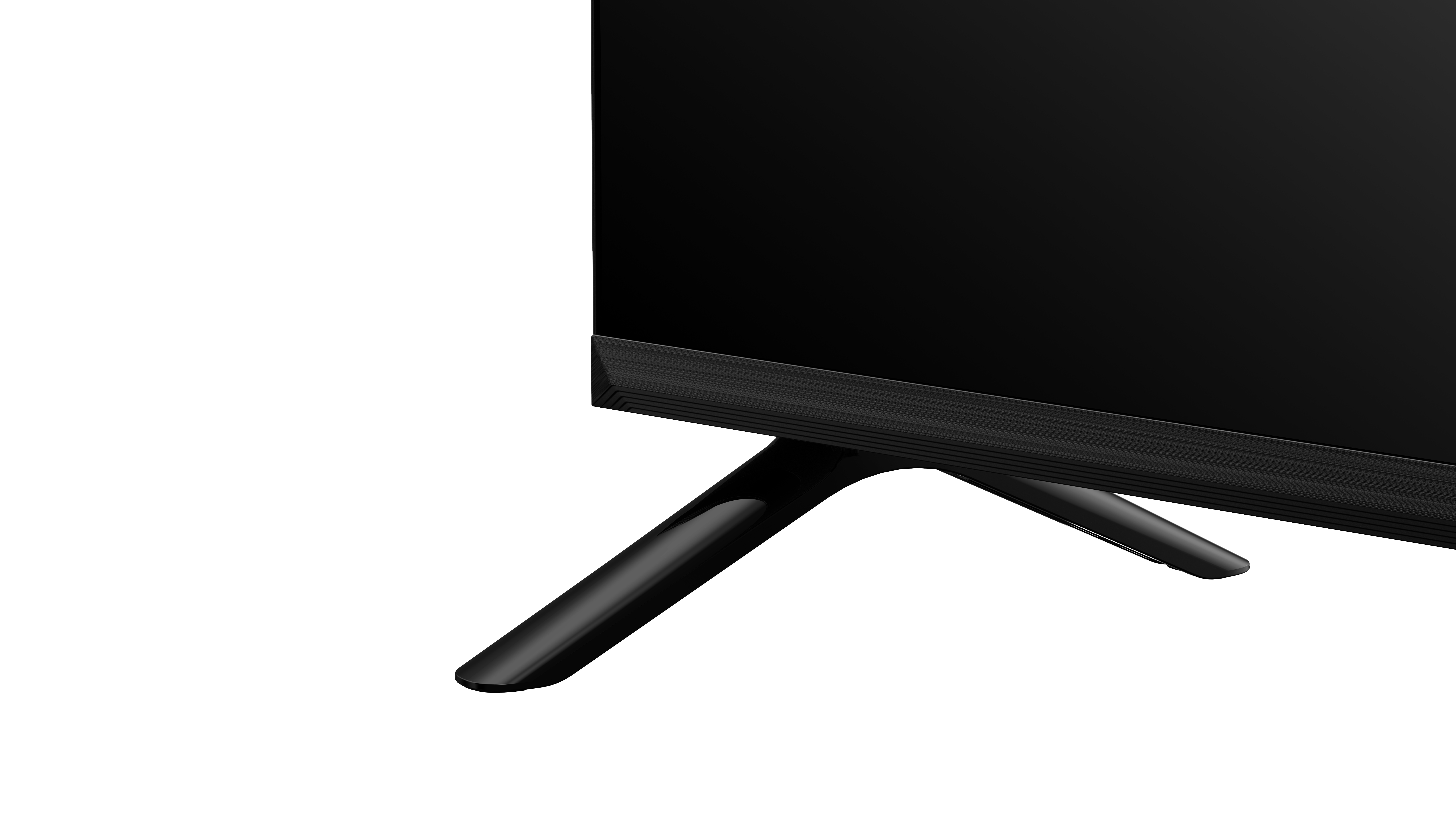 Zbliżenie czarnego telewizora z podstawą w kształcie litery V na białym tle.