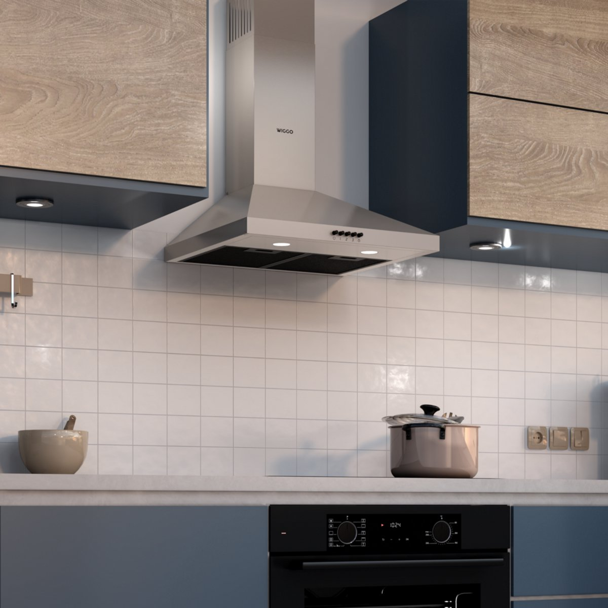 Stainless steel range hood over white tiles, with pot and mortar bowl.