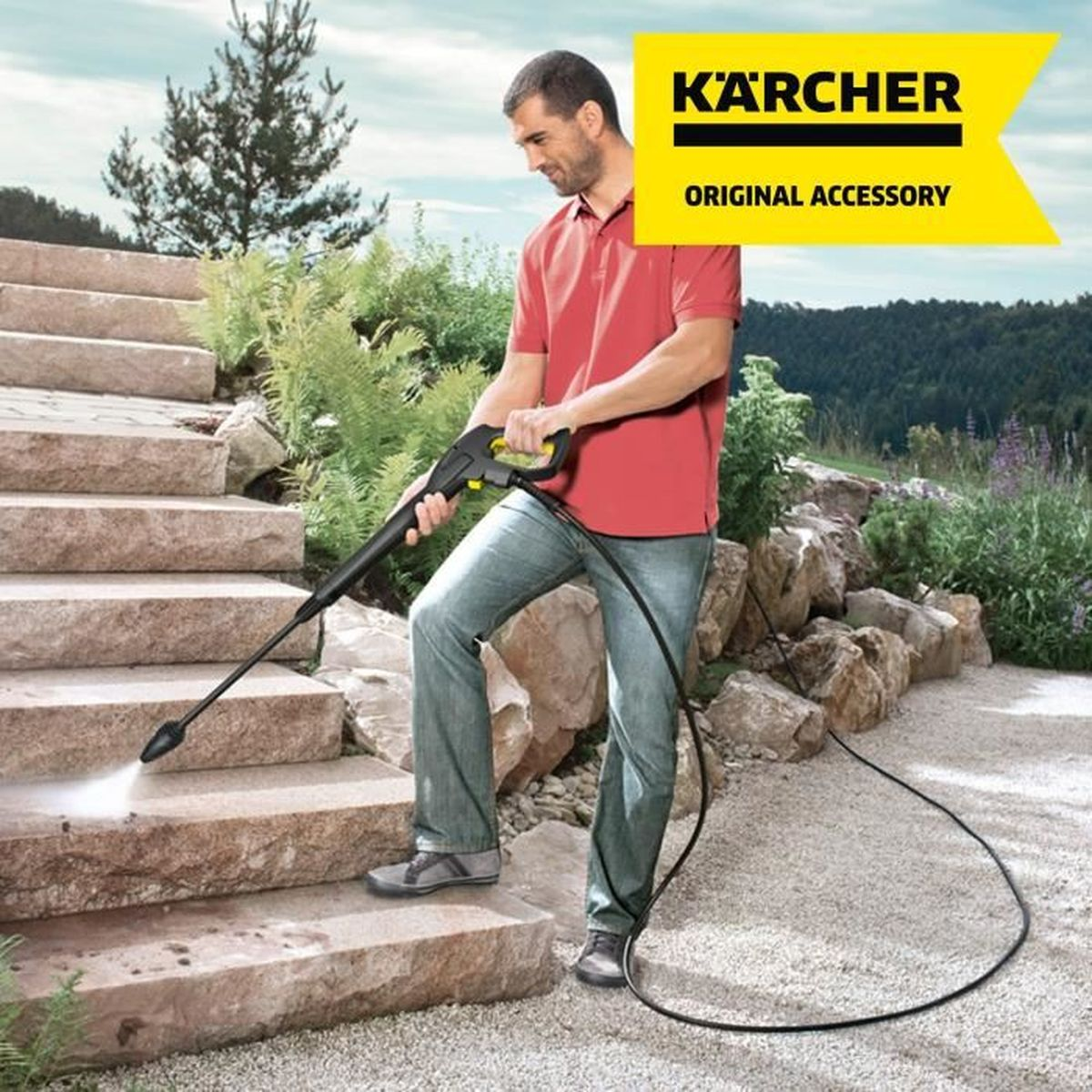 Man cleans stone steps with a pressure washer. Kärcher logo.