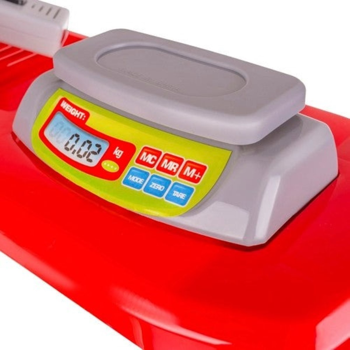 Una báscula roja con pantalla digital de 0.02 kg y botones.