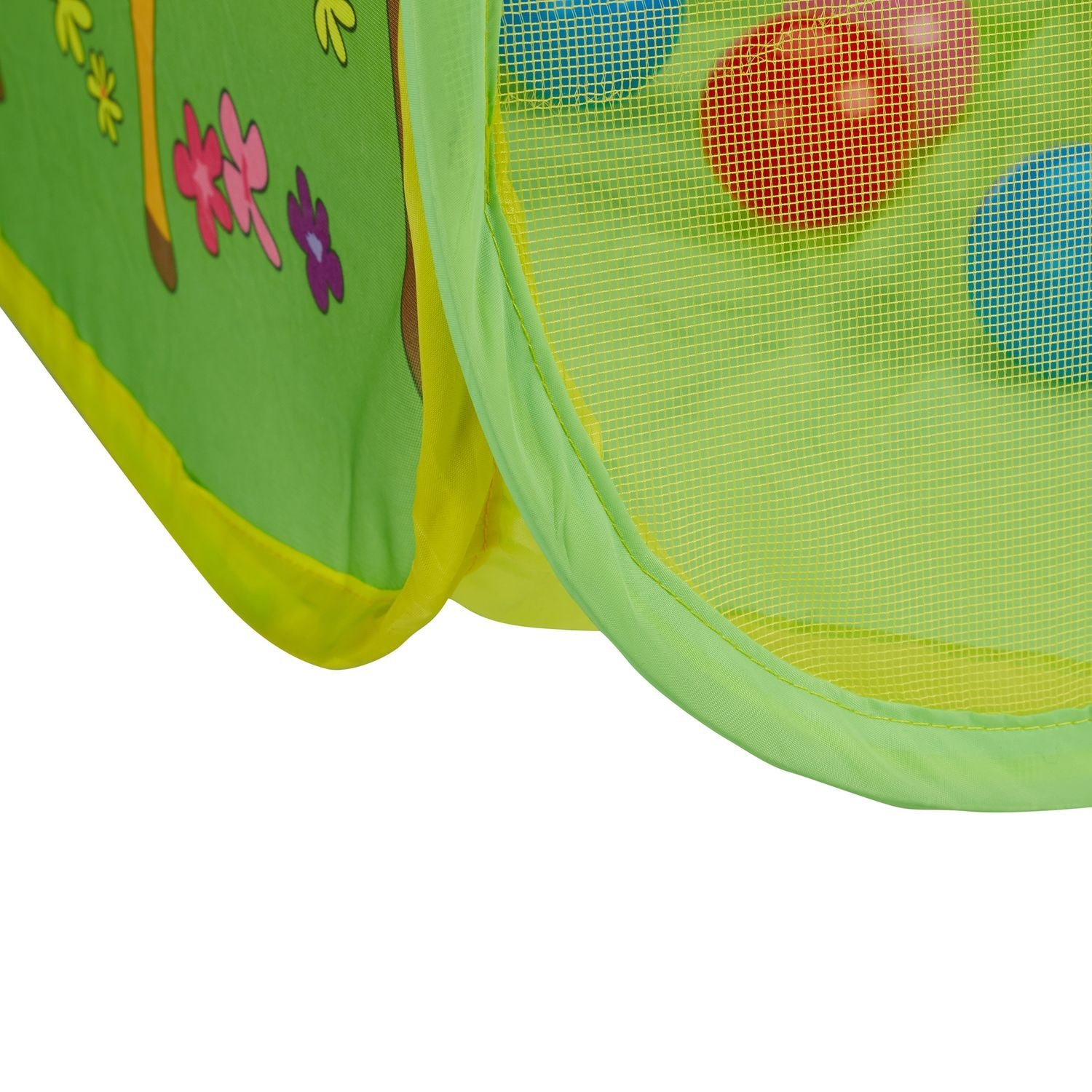 Tienda de juegos verde con pelotas coloridas y motivos de animales.