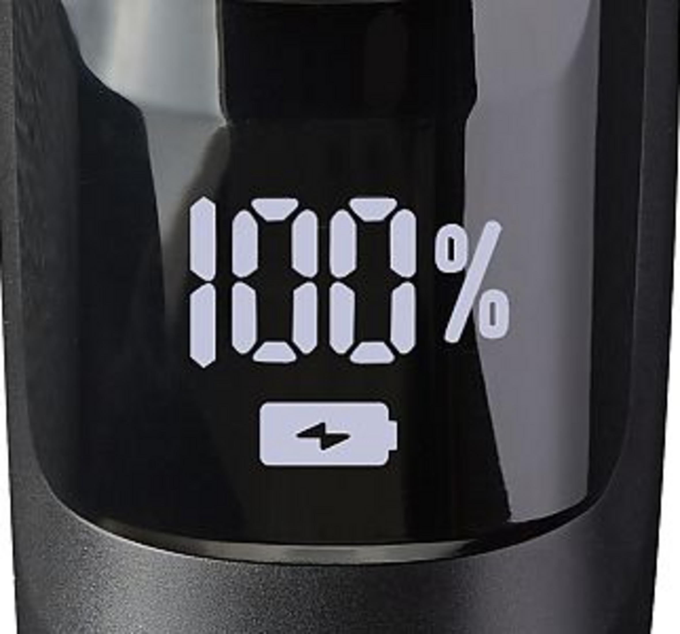 Digitaal display toont 100% batterij met bliksemschicht-icoon.