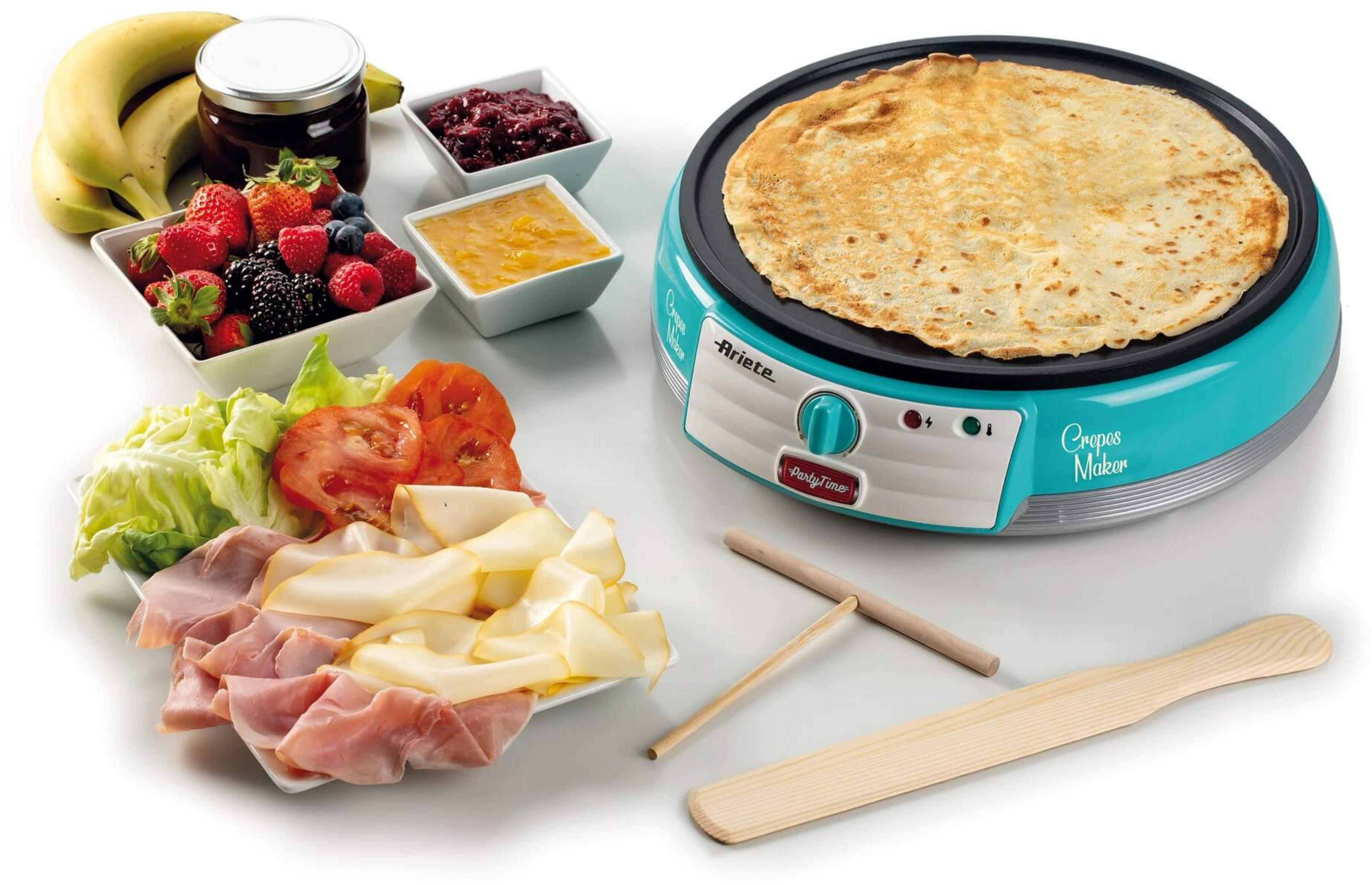 Maszyna do naleśników z jagodami, bananami, dżemami, serem i szynką.