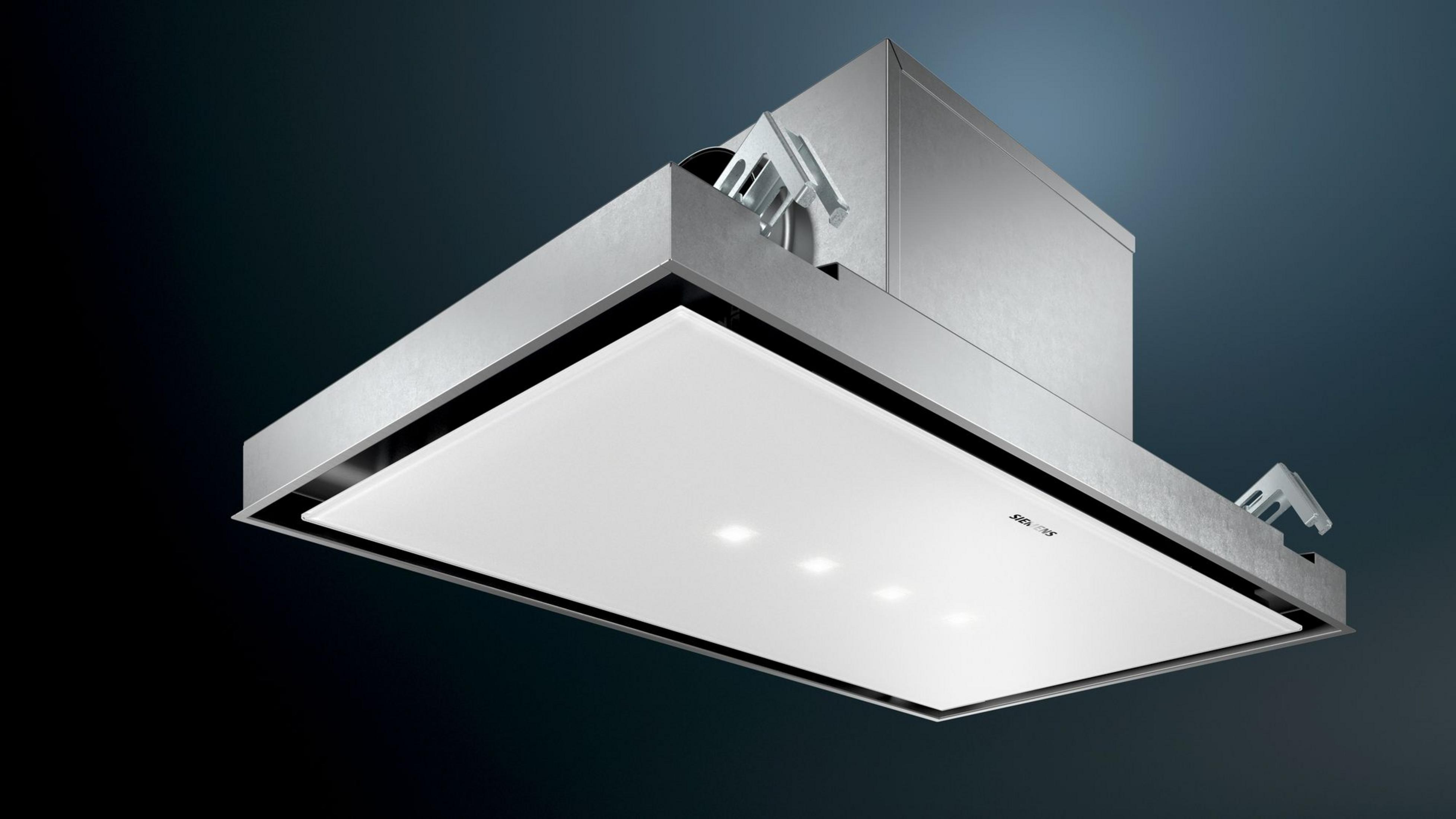 A modern stainless steel range hood with a white glass front and integrated lights.