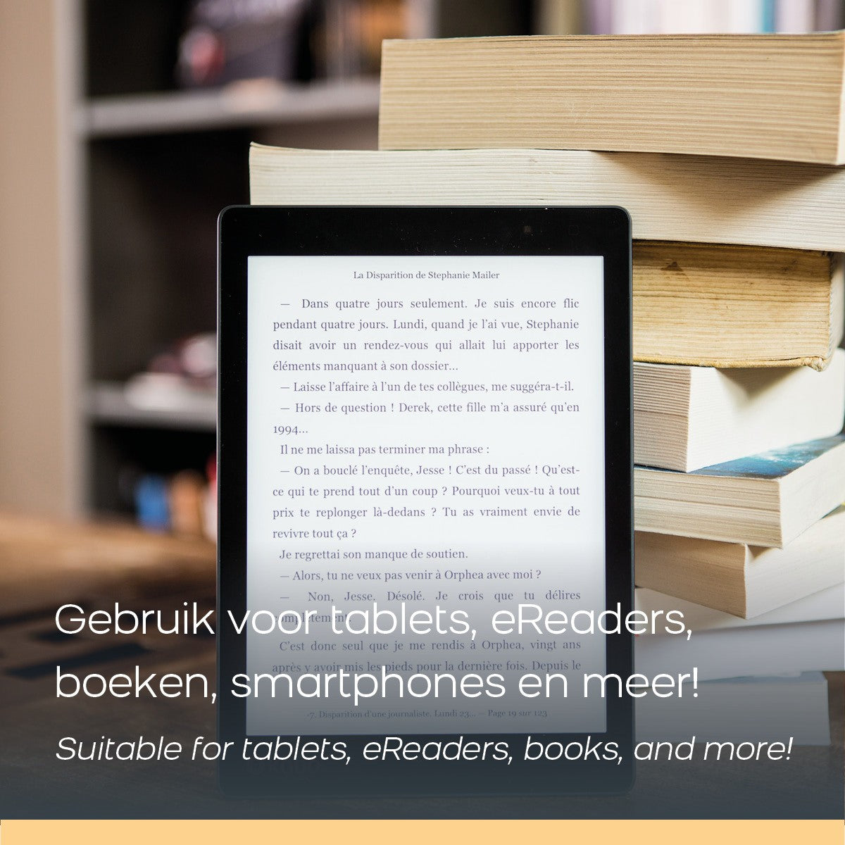 Un lector electrónico delante de una pila de libros. Texto en pantalla.