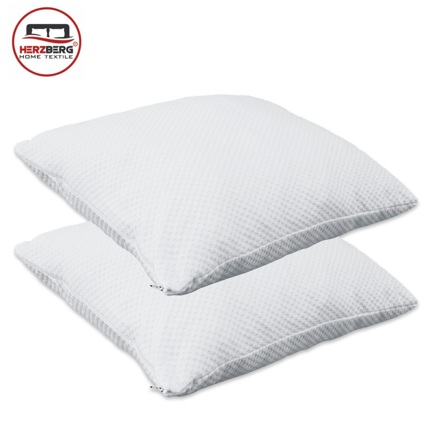 Dos almohadas blancas con cremalleras y funda de gofres.