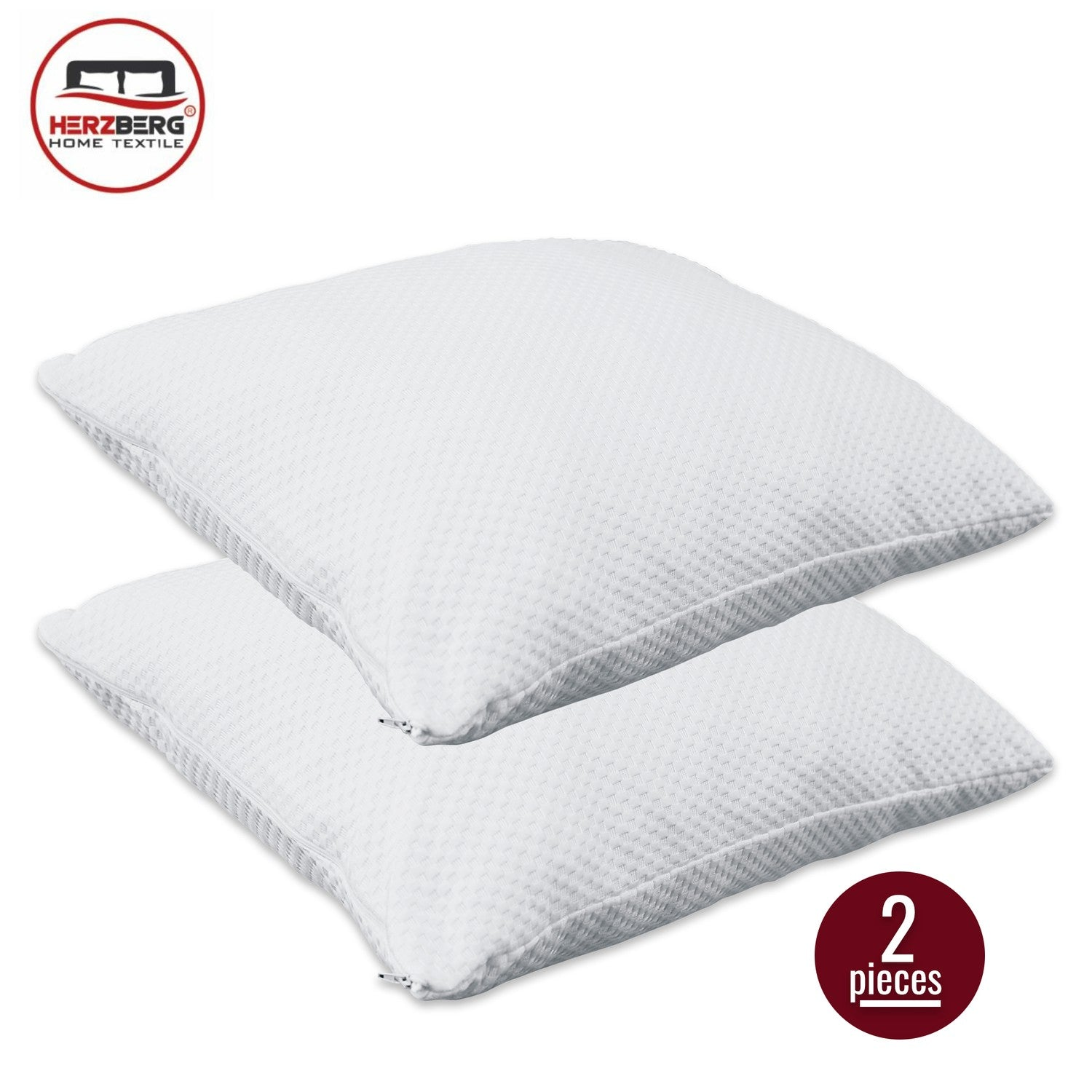 Dos almohadas blancas con funda texturizada y cremalleras. Se ven un logo y '2 piezas'.