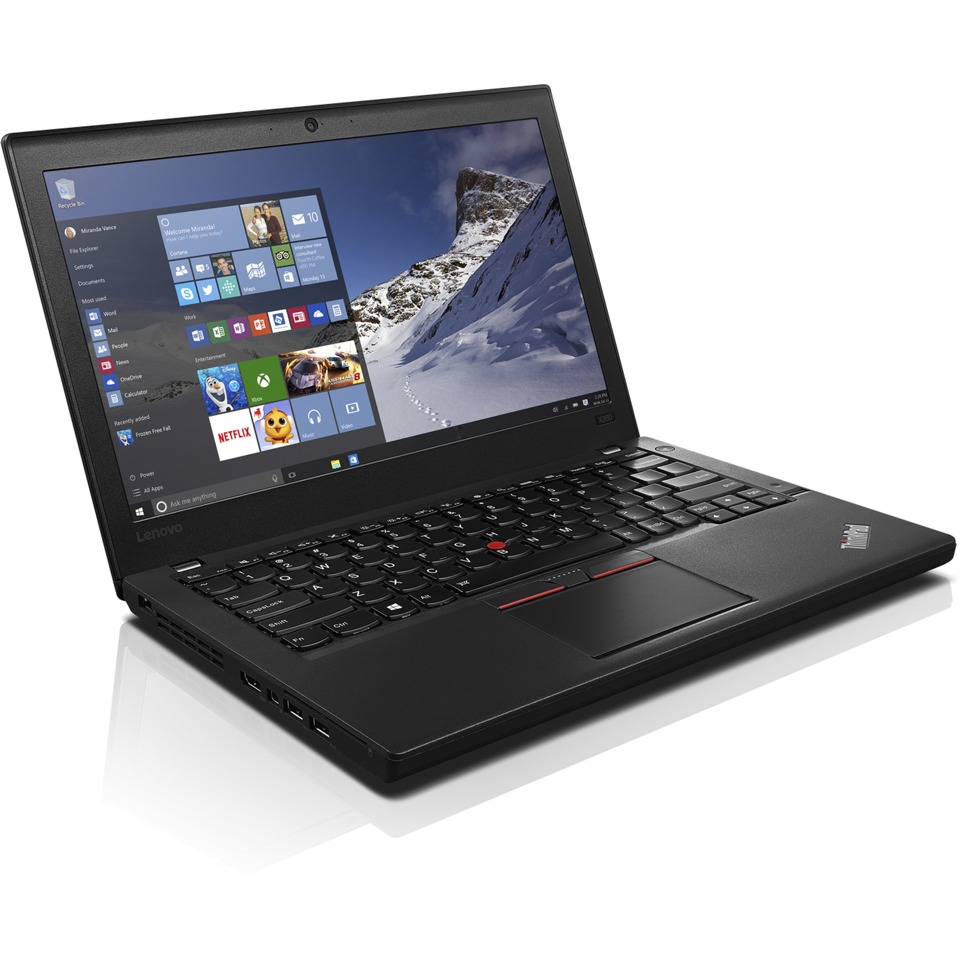 Ein schwarzer Lenovo ThinkPad Laptop ist geöffnet. Der Bildschirm zeigt Windows 10 mit Apps und einem Bergmotiv.