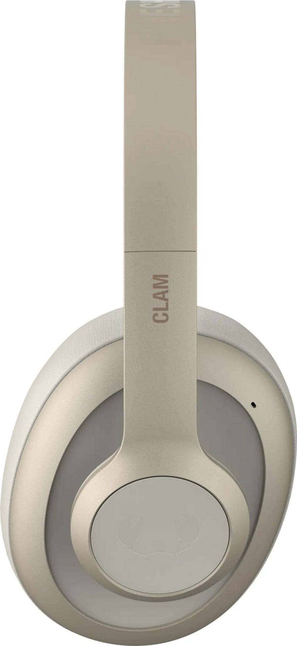 Beżowe słuchawki z napisem 'CLAM' i symbolem kraba.