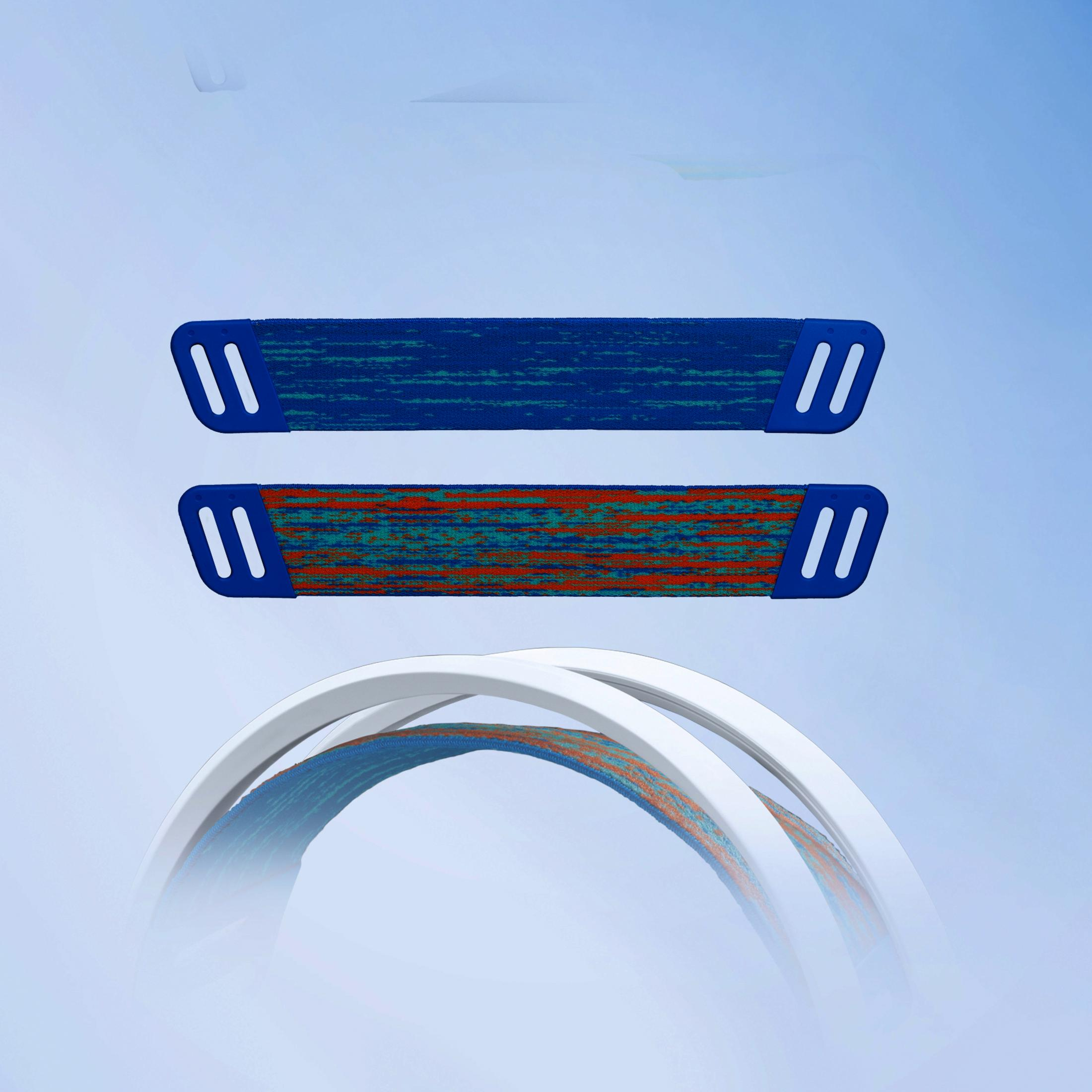 Two blue textile bands with patterns over white arch on blue sky.