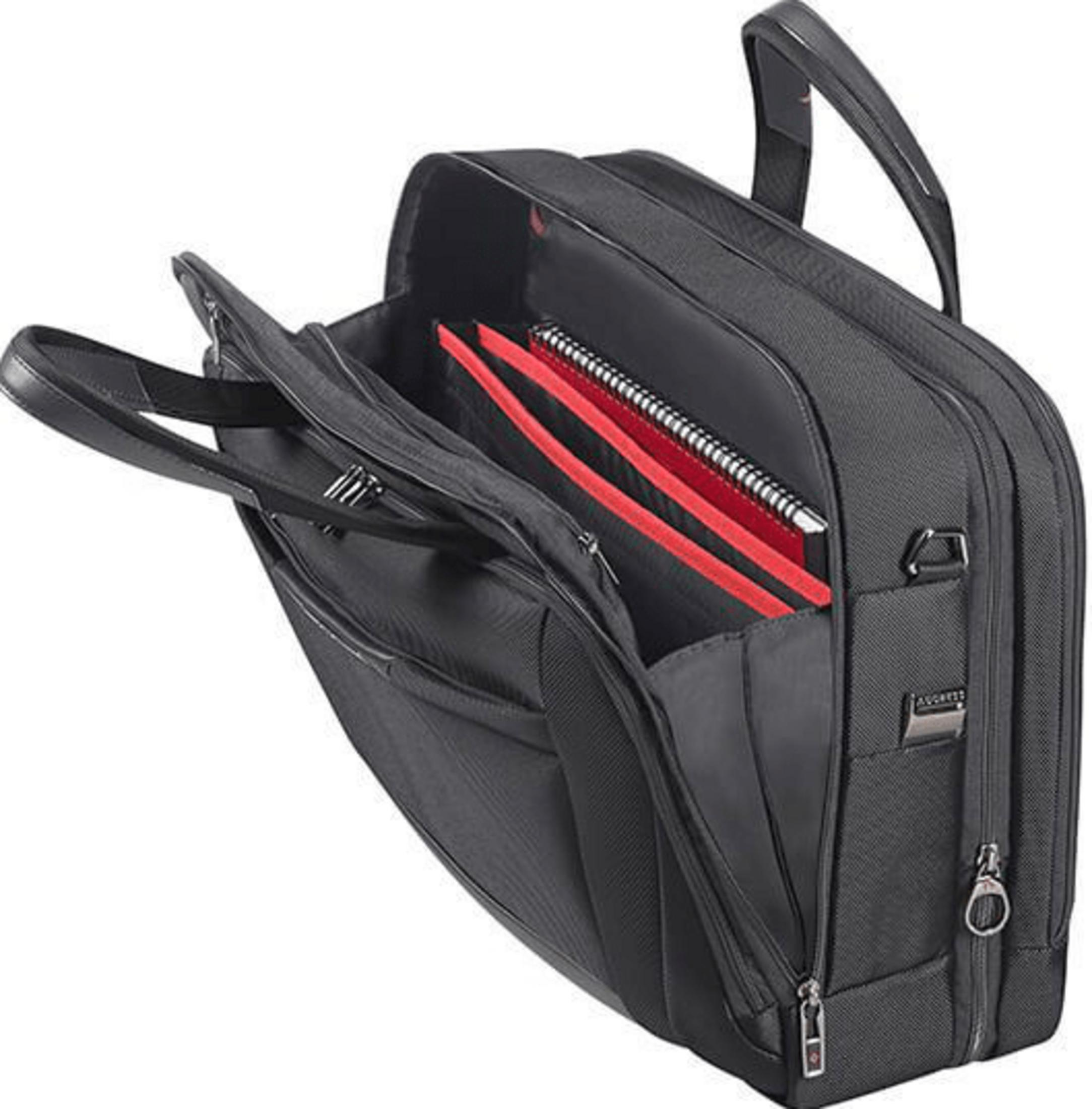 Sacoche noire avec compartiment ouvert, dossiers rouges et carnet.