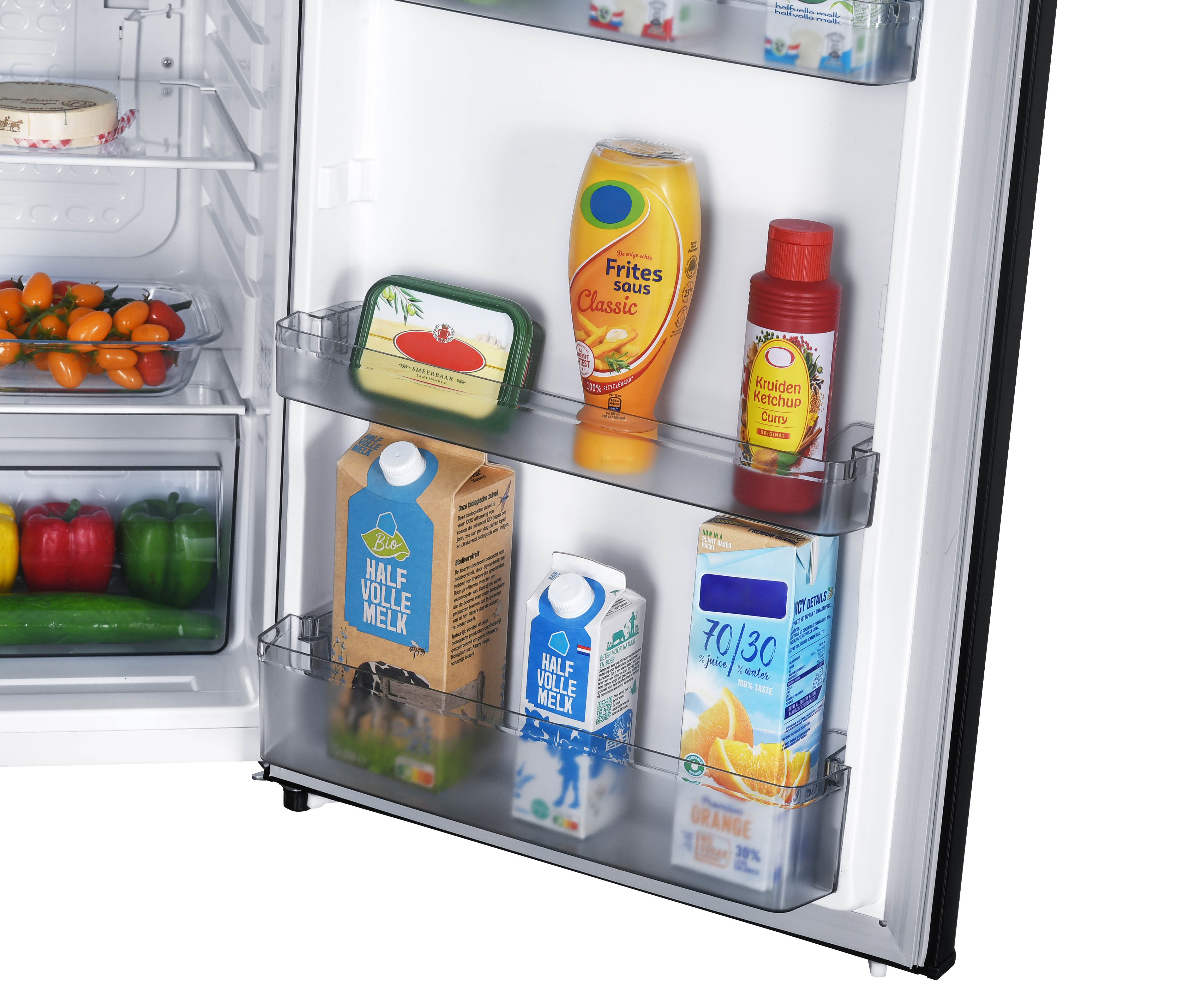 Refrigerator door with milk, sauce, ketchup, juice, and vegetables.
