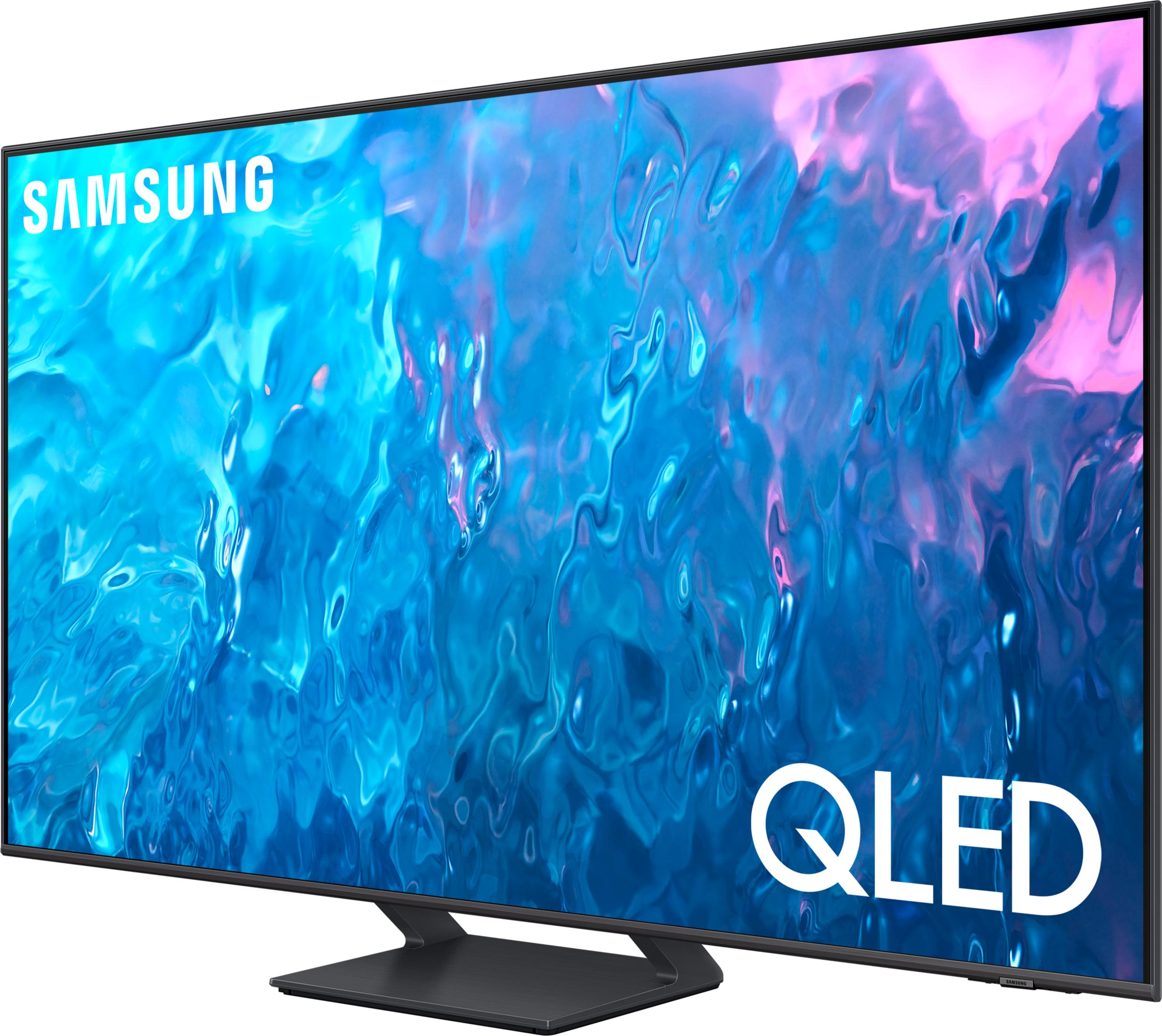 Telewizor Samsung QLED z abstrakcyjnym niebiesko-różowym tłem.