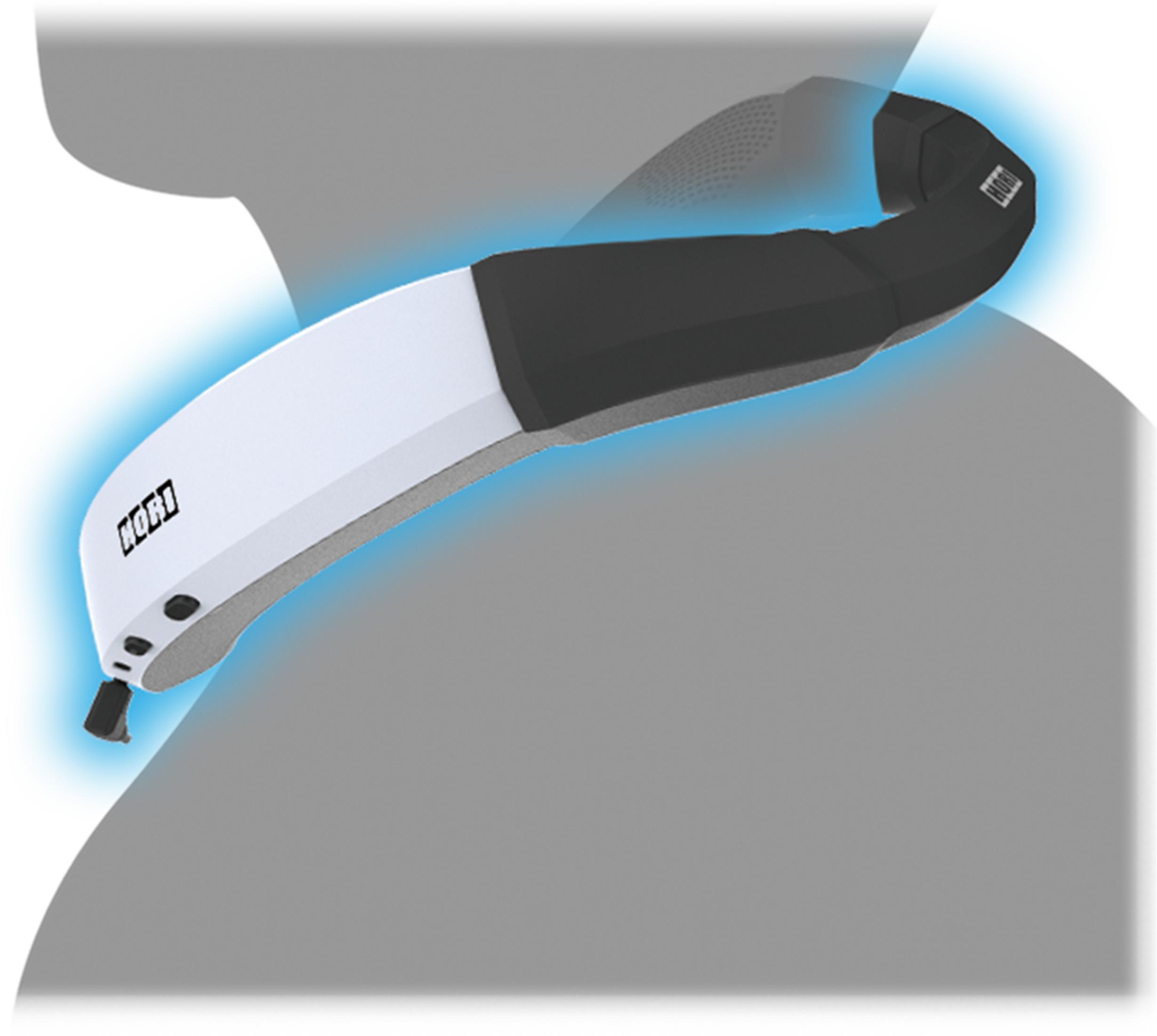 Białe i czarne urządzenie z niebieskimi światłami spoczywające na szarej powierzchni.