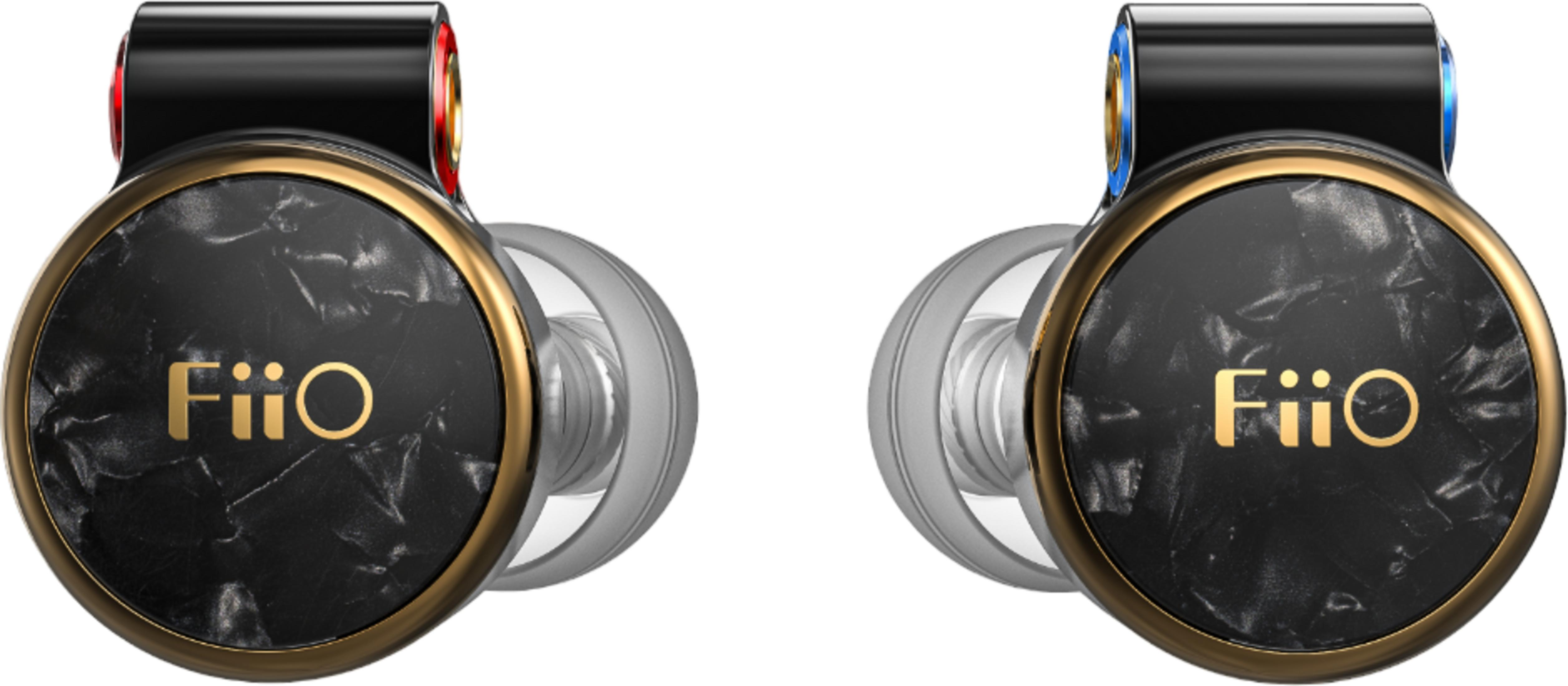 Due auricolari FiiO neri con finiture dorate e motivo marmoreo.