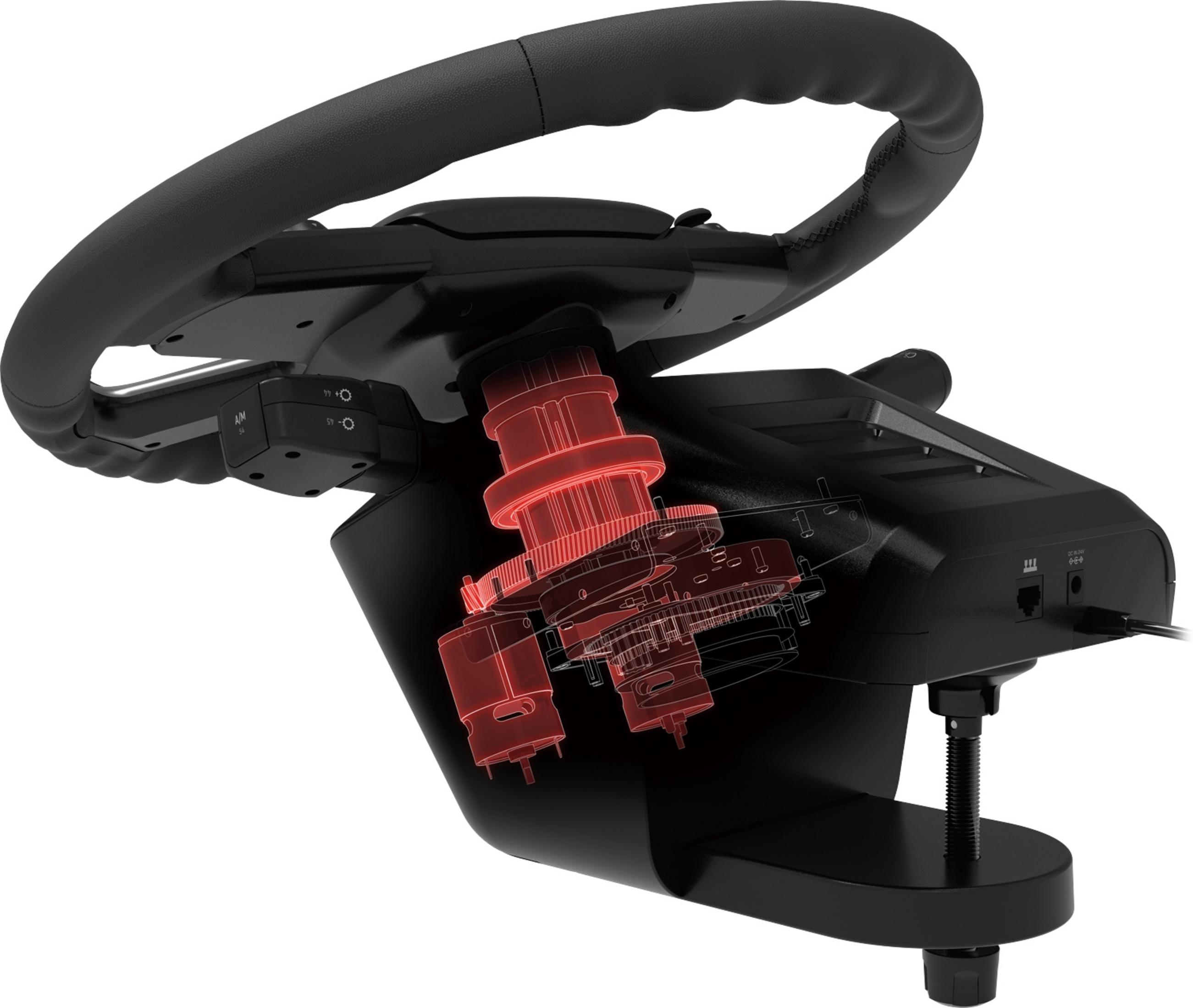 Czarne koło kierownicy z widocznymi czerwonymi zębatkami w środku.