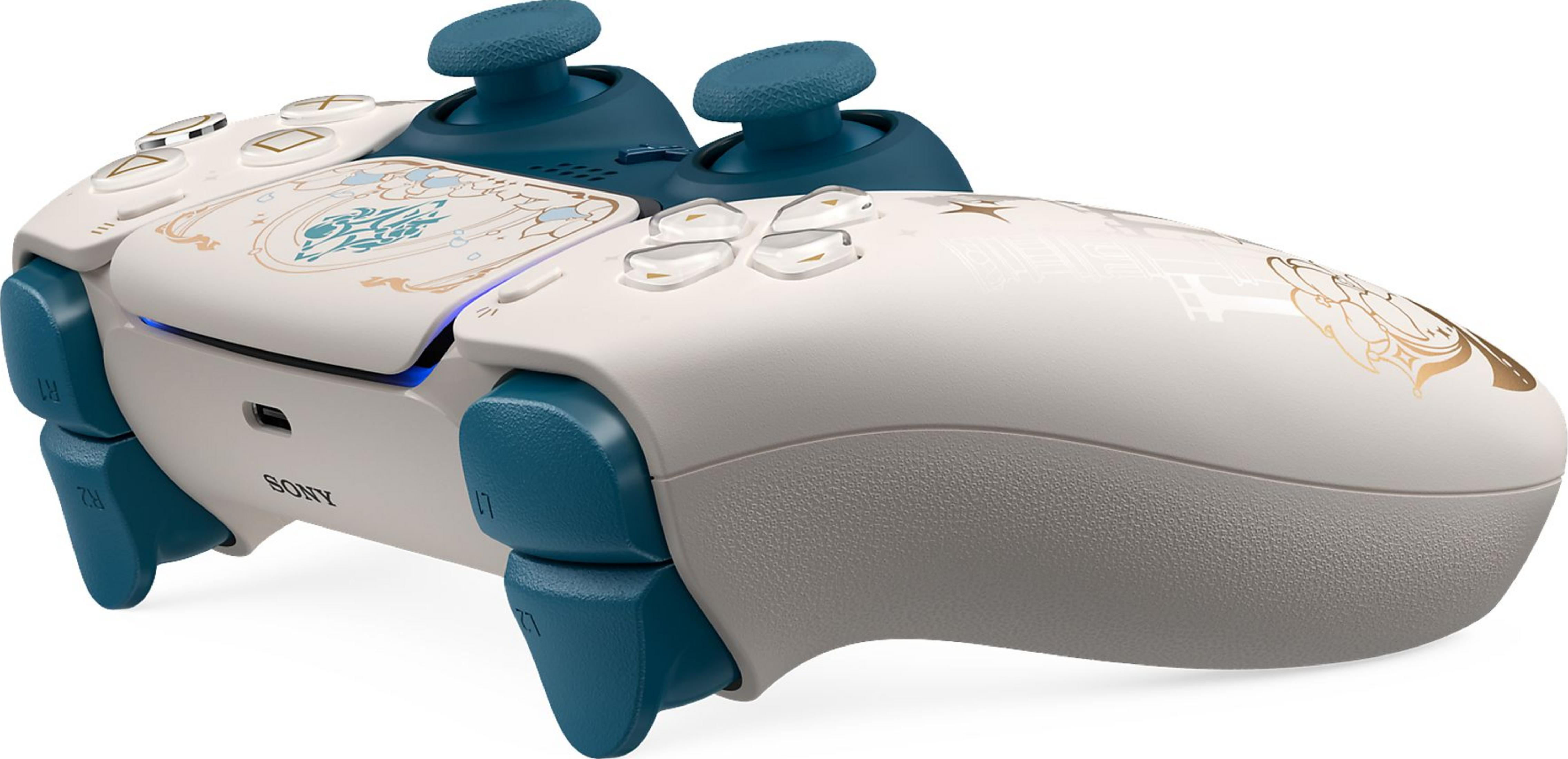 Ein weißer Controller mit blauen Griffen und goldenen Verzierungen.