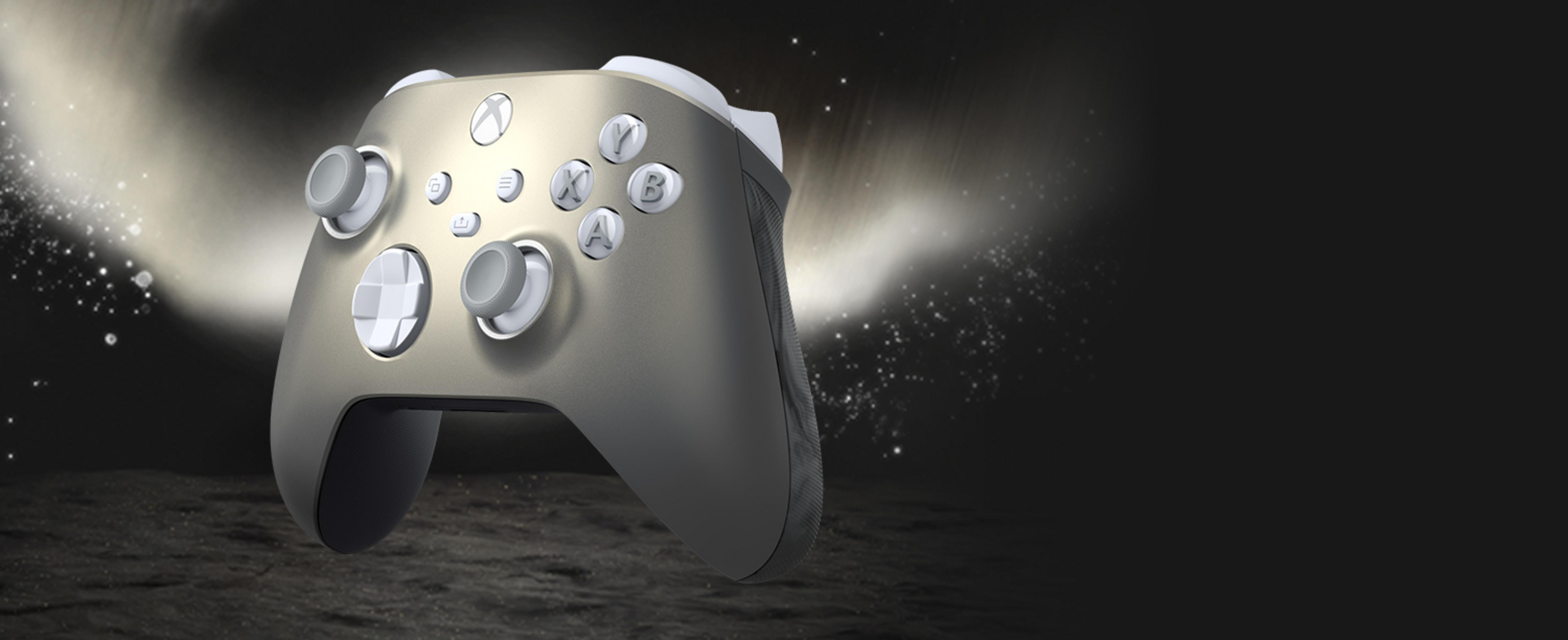 Ein goldener Xbox-Controller mit weißen Knöpfen auf dunklem, funkelndem Hintergrund.