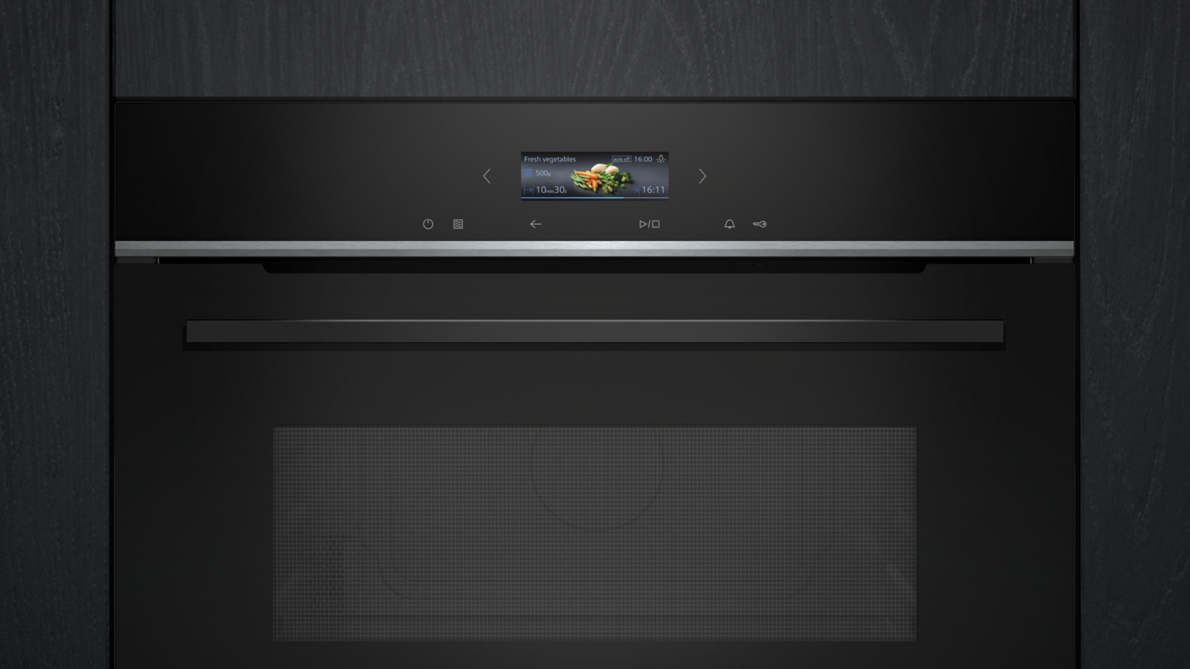 Moderne oven met touchscreen. Toont verse groenten, 500g, 10 min 30 sec.