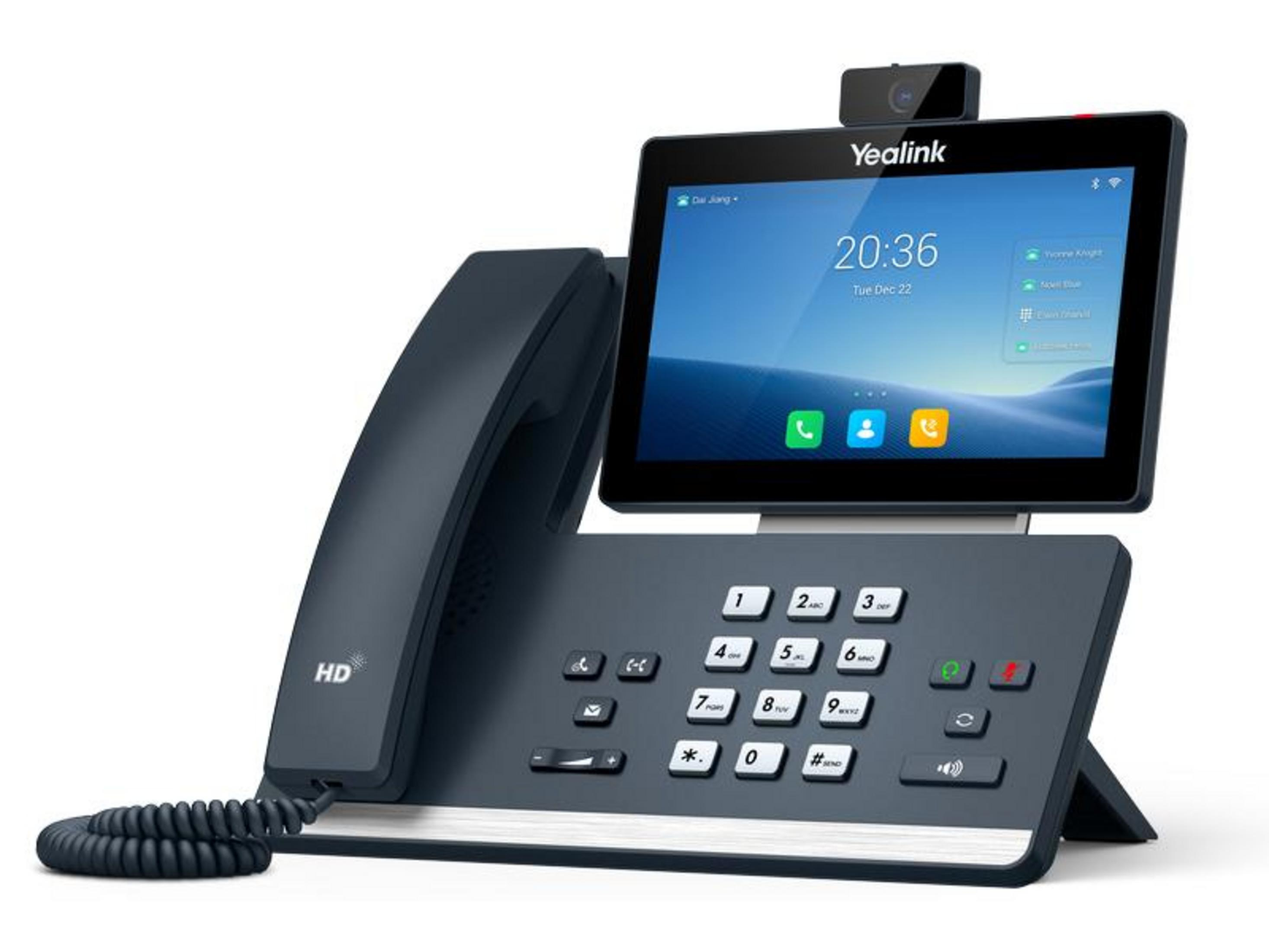 Ciemny telefon konferencyjny Yealink z słuchawką, ekranem dotykowym i kamerą.