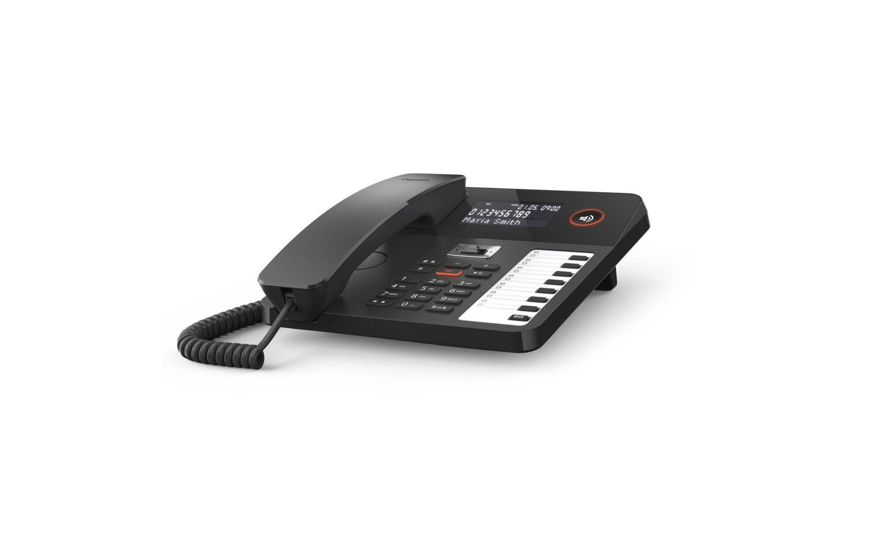 Un telefono fisso nero con tasti numerici, display e cornetta.