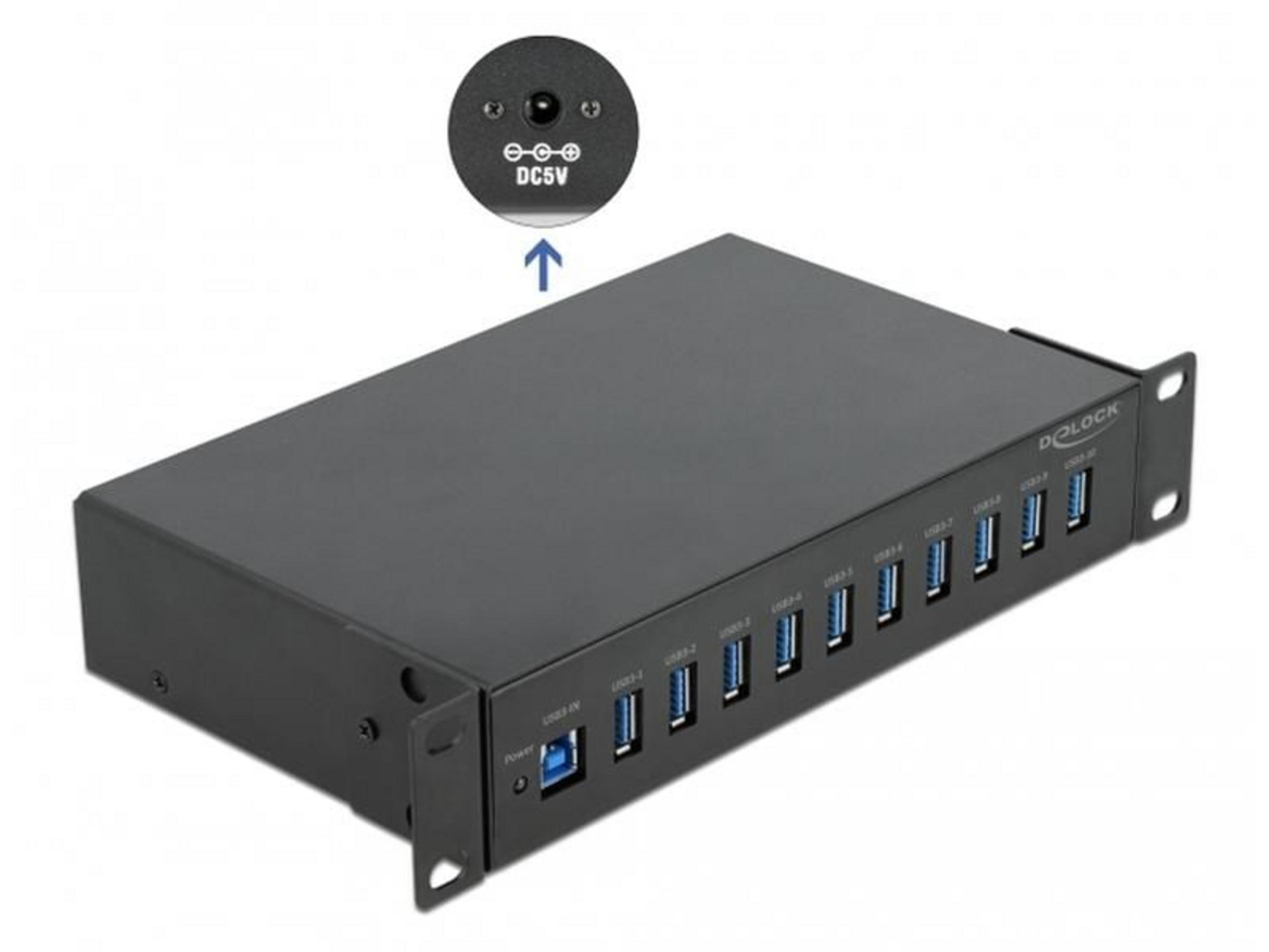 Schwarzer USB-Hub mit 11 Anschlüssen und DC5V-Eingang.