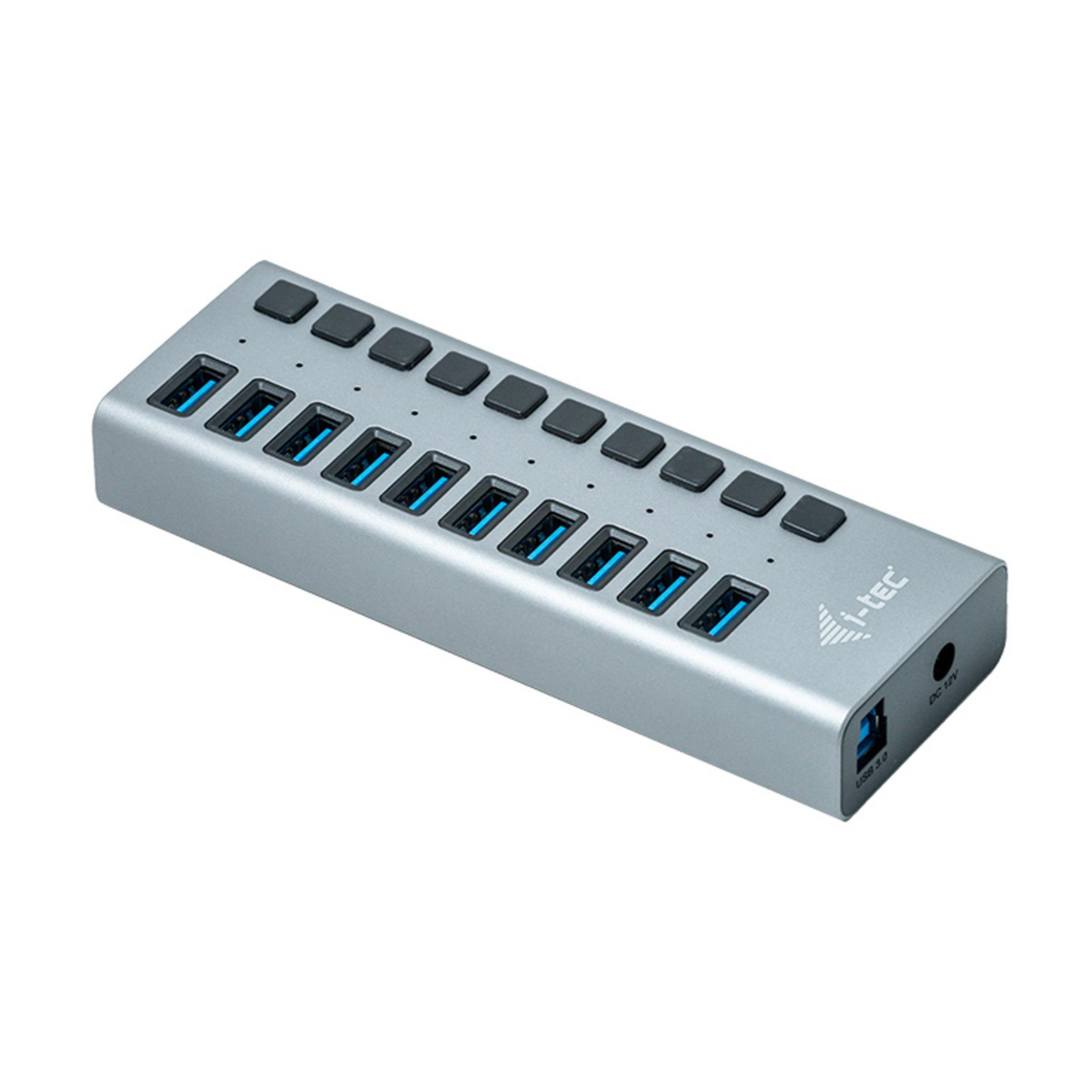 Hub USB plateado con 16 puertos y botones negros, sobre fondo blanco.