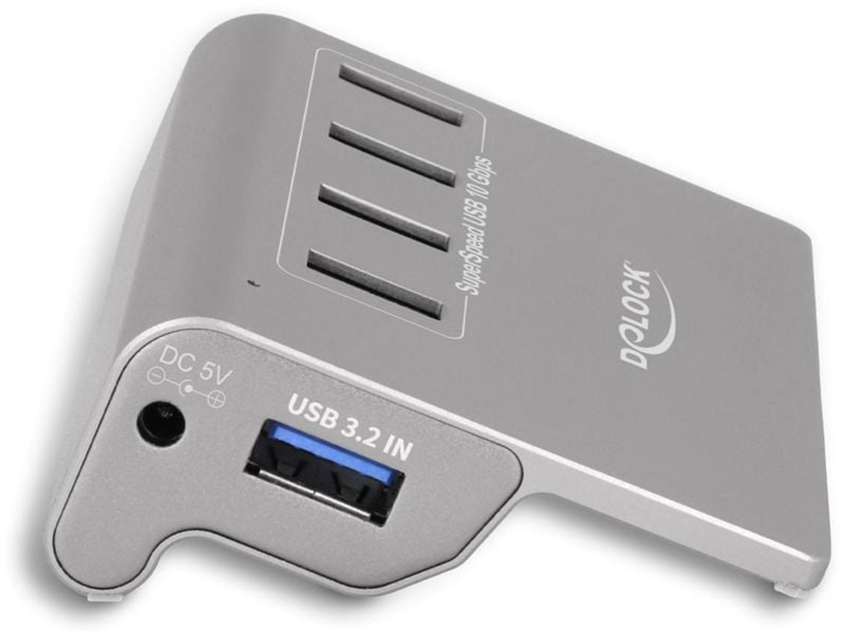 Silberner USB-C-Hub mit vier Anschlüssen und „SuperSpeed USB 10 Gbps“.