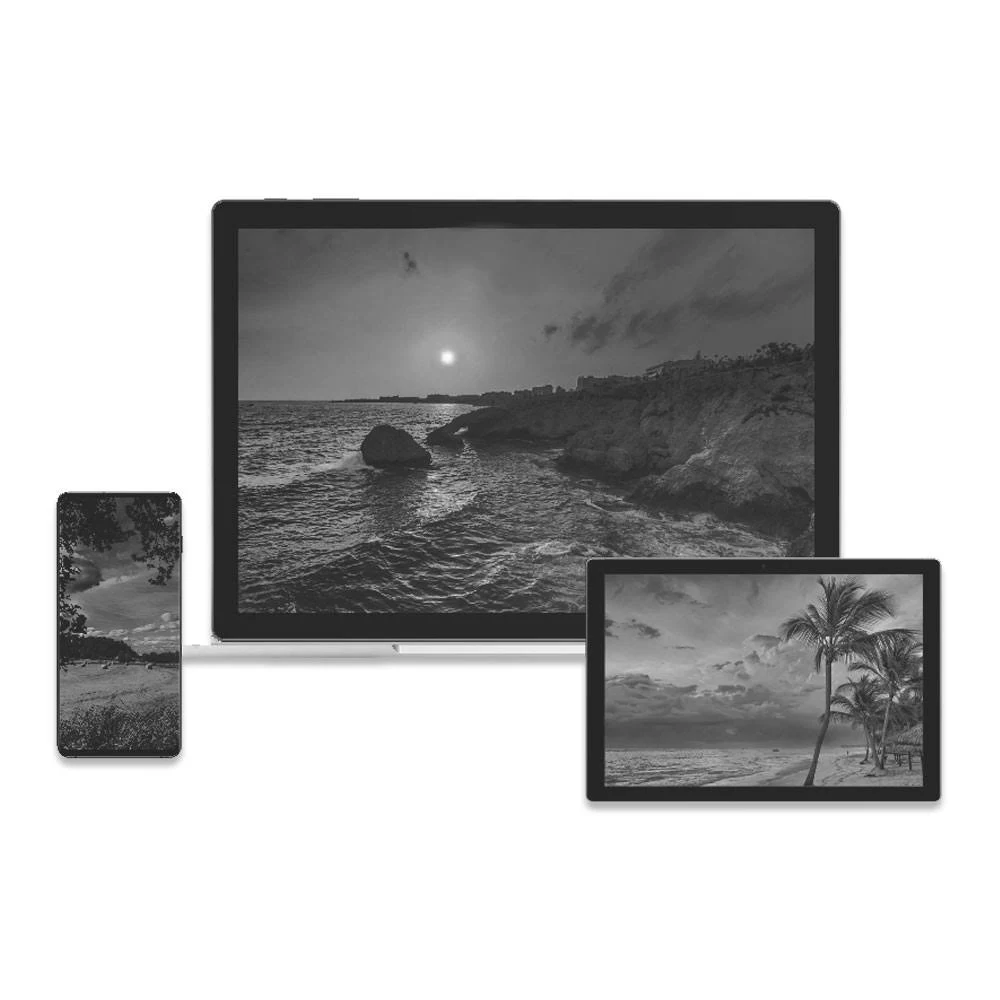 Trzy ekrany wyświetlają tropikalne plaże i skaliste wybrzeża o zachodzie słońca.