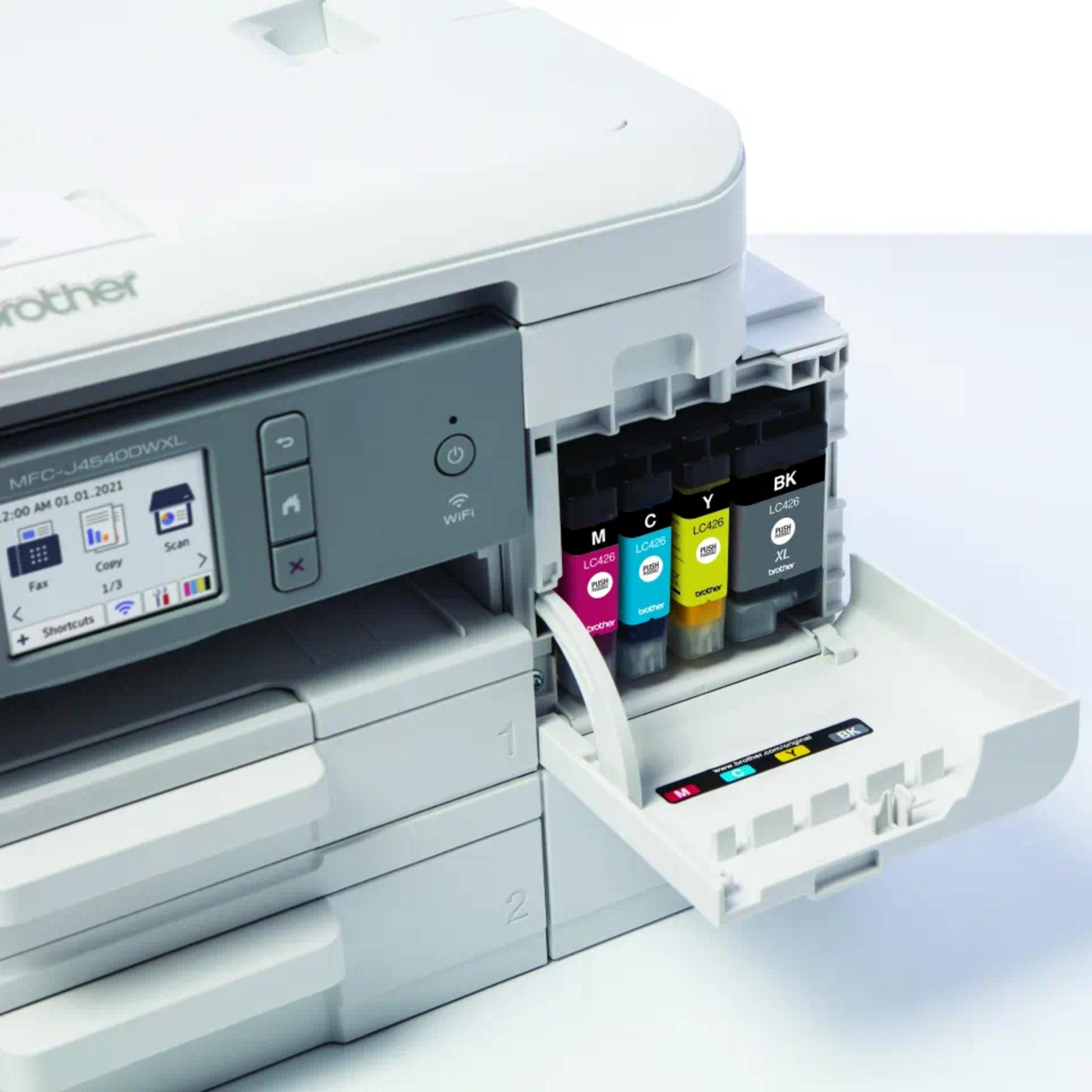 Drukarka Brother z czterema wkładami atramentowymi: magenta, cyjan, żółty i czarny.