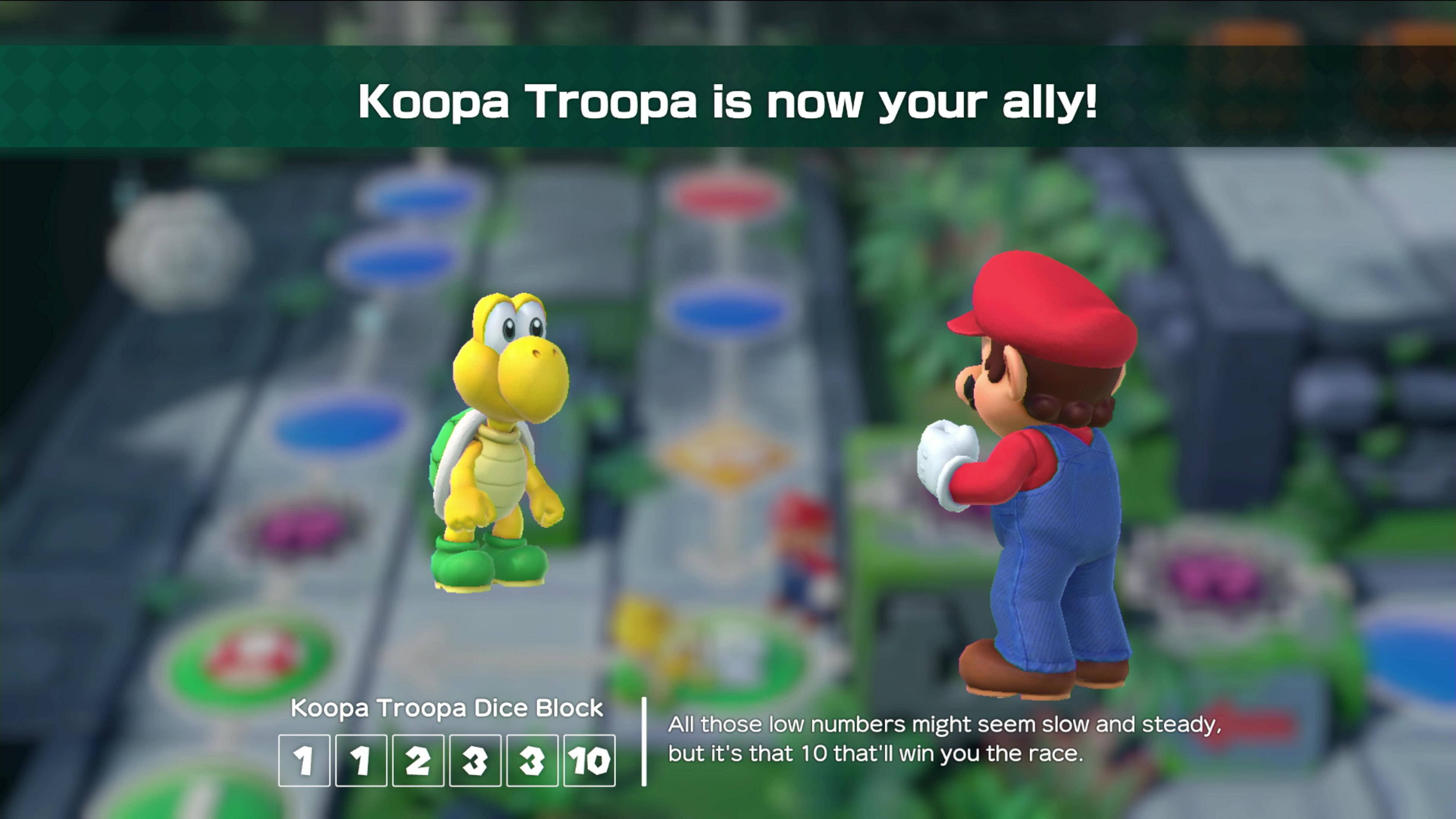 Mario i Koopa Troopa stoją na planszy. Koopa Troopa jest teraz sojusznikiem.