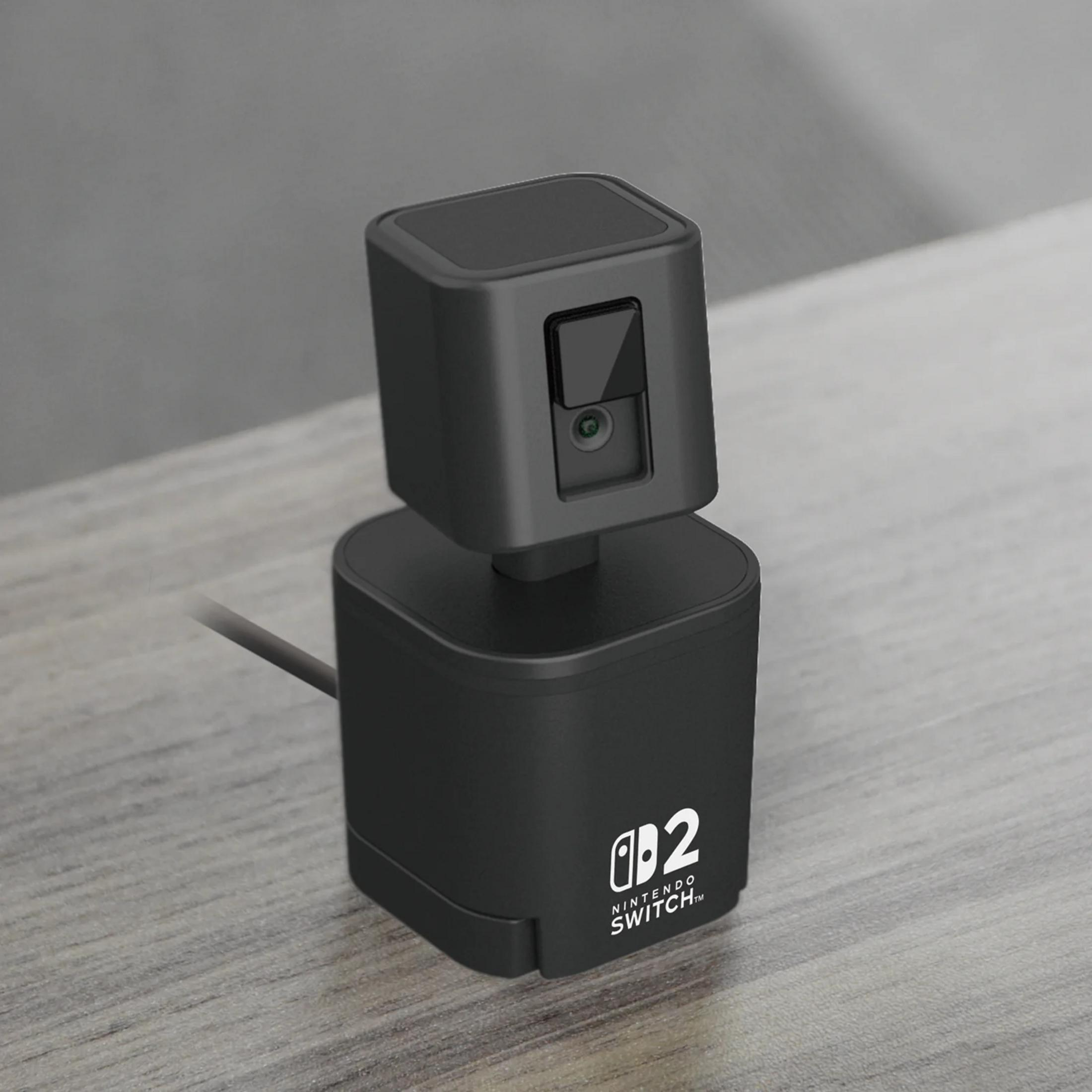 Sensore fotocamera nero Nintendo Switch 2 su tavolo legno.