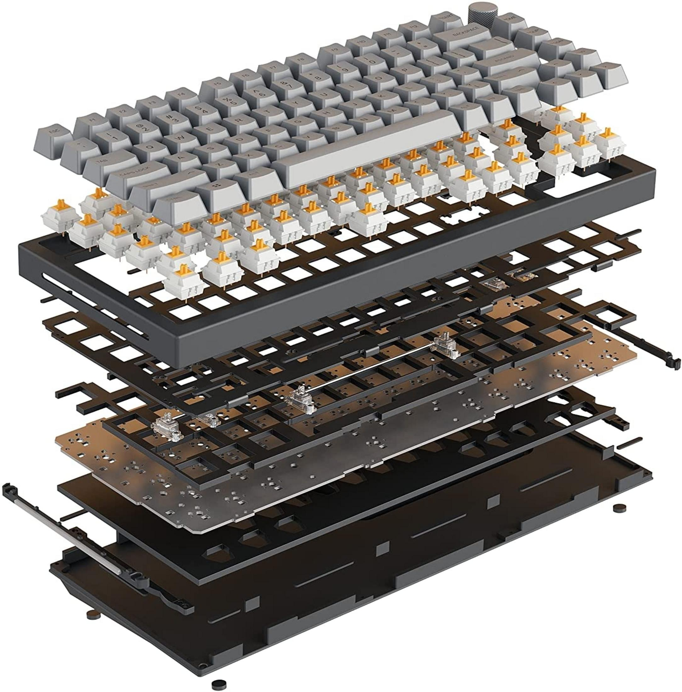 Explodierte Ansicht einer grauen Tastatur mit freiliegenden weißen Schaltern und inneren Komponenten.