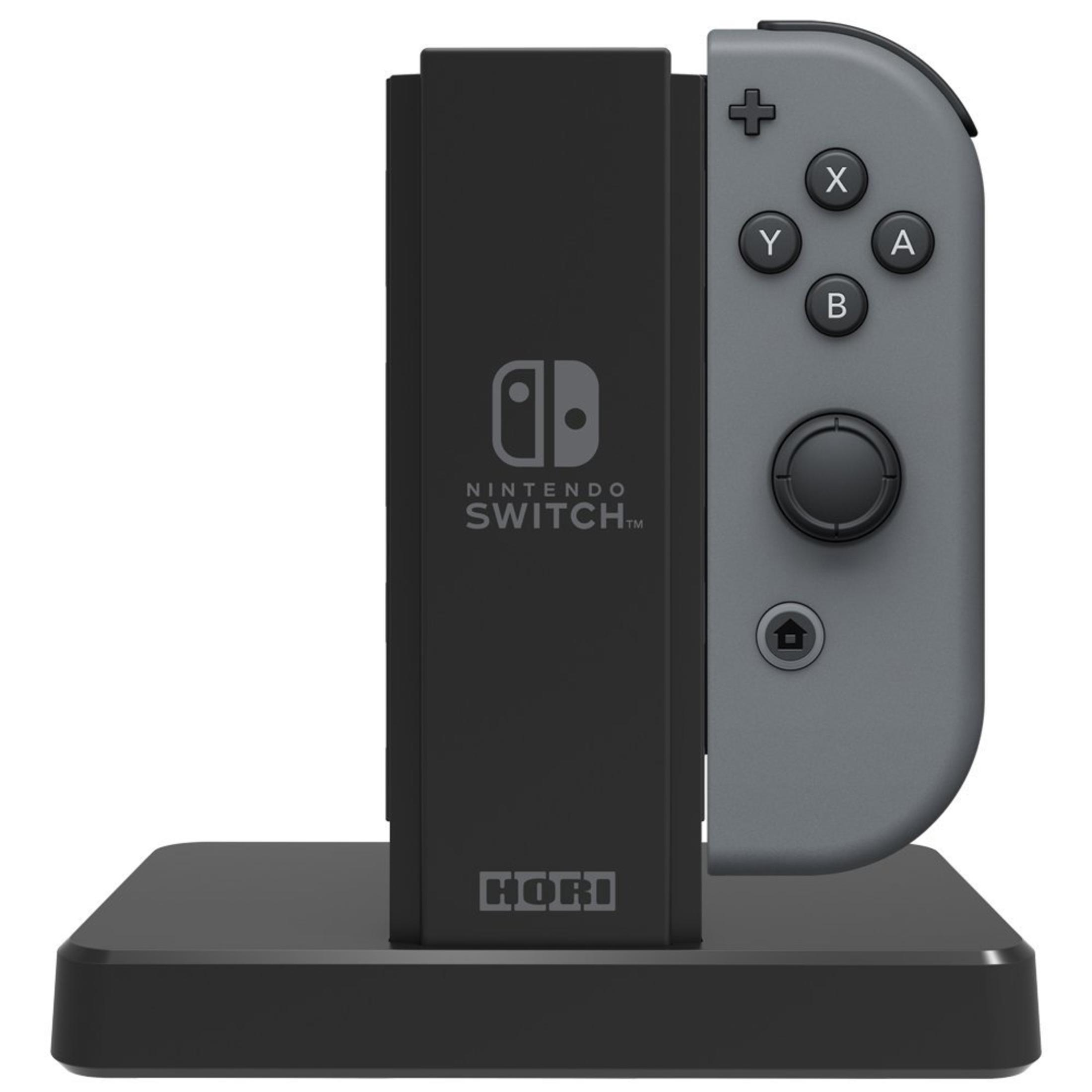 Controller Joy-Con grigio Nintendo Switch su base di ricarica nera con logo HORI.