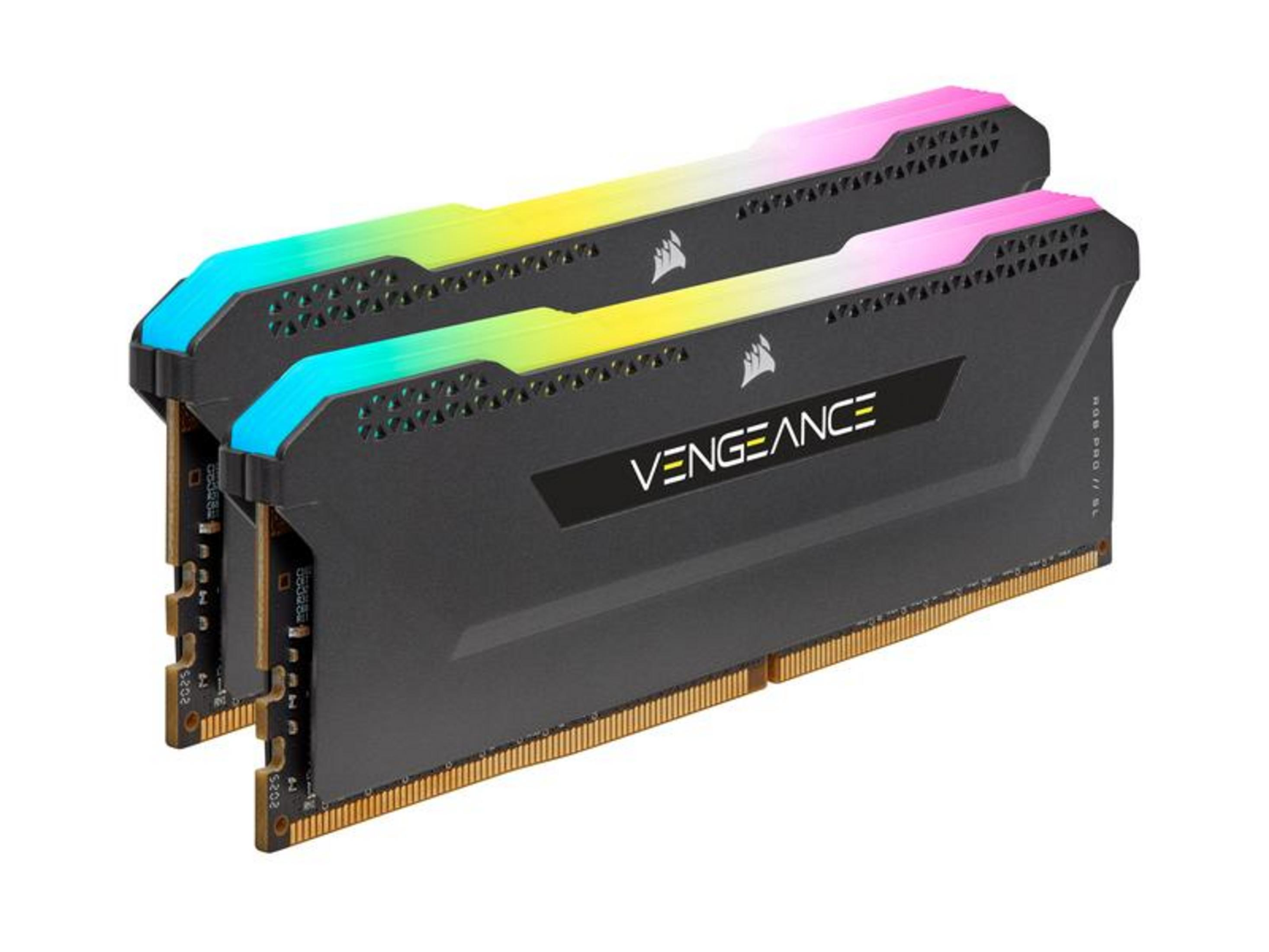 Dos módulos RAM negros con iluminación RGB en azul, verde, amarillo y rosa.