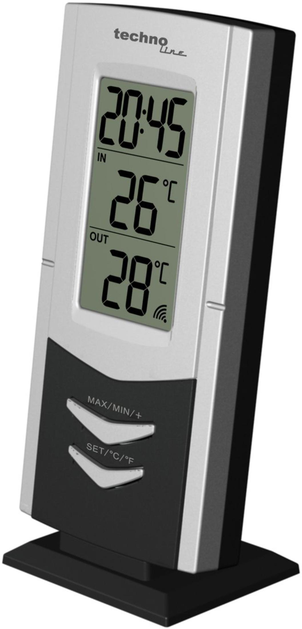 Termometr cyfrowy pokazuje 26°C wewnątrz i 28°C na zewnątrz.