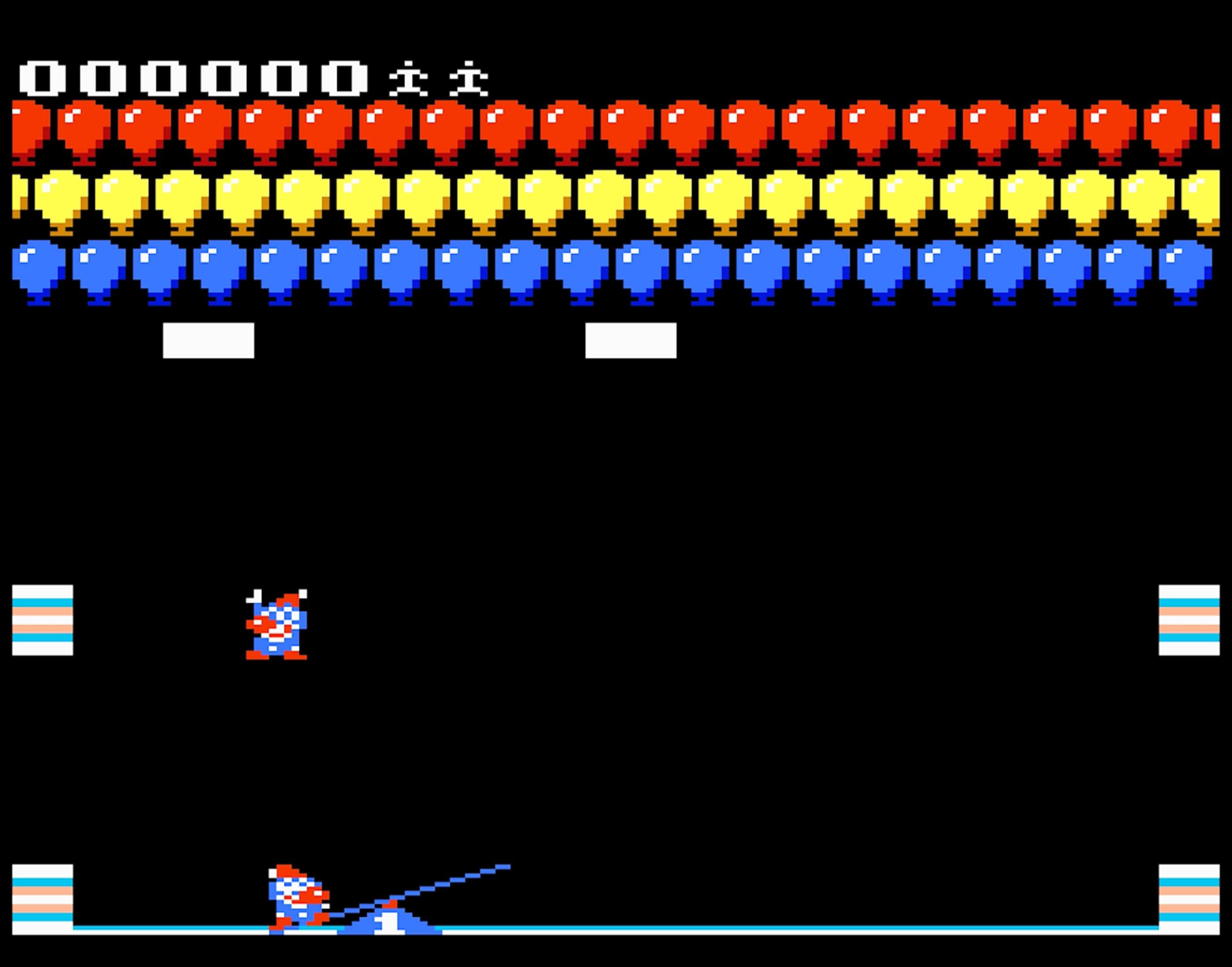 Videogioco pixel con palloncini rossi, gialli e blu in alto. Figure in blu e bianco in basso.