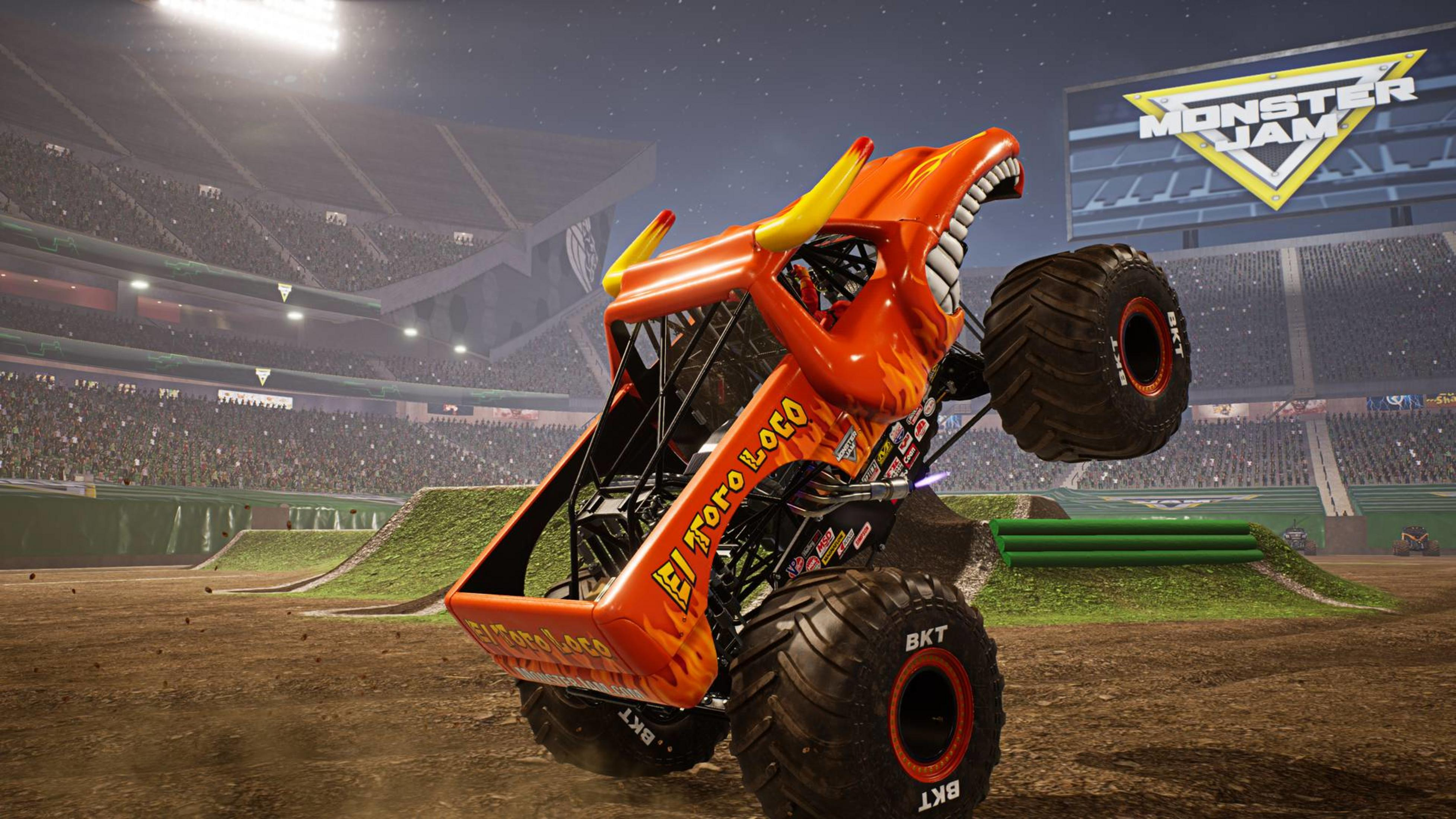 Pomarańczowy monster truck o nazwie El Toro Loco występuje na stadionie.