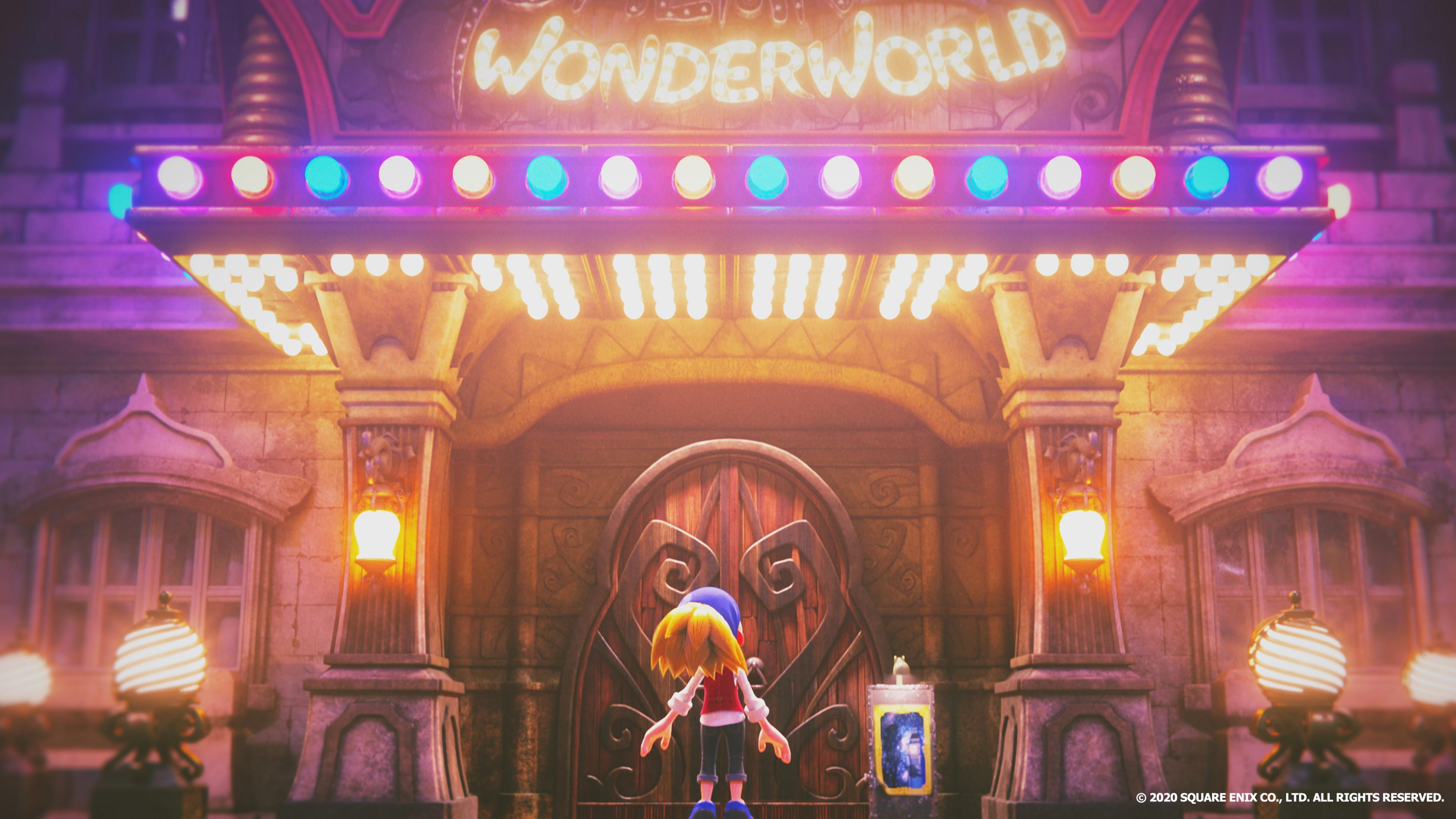 Ein Kind steht vor einem beleuchteten Eingang mit der Aufschrift "Wonderworld".
