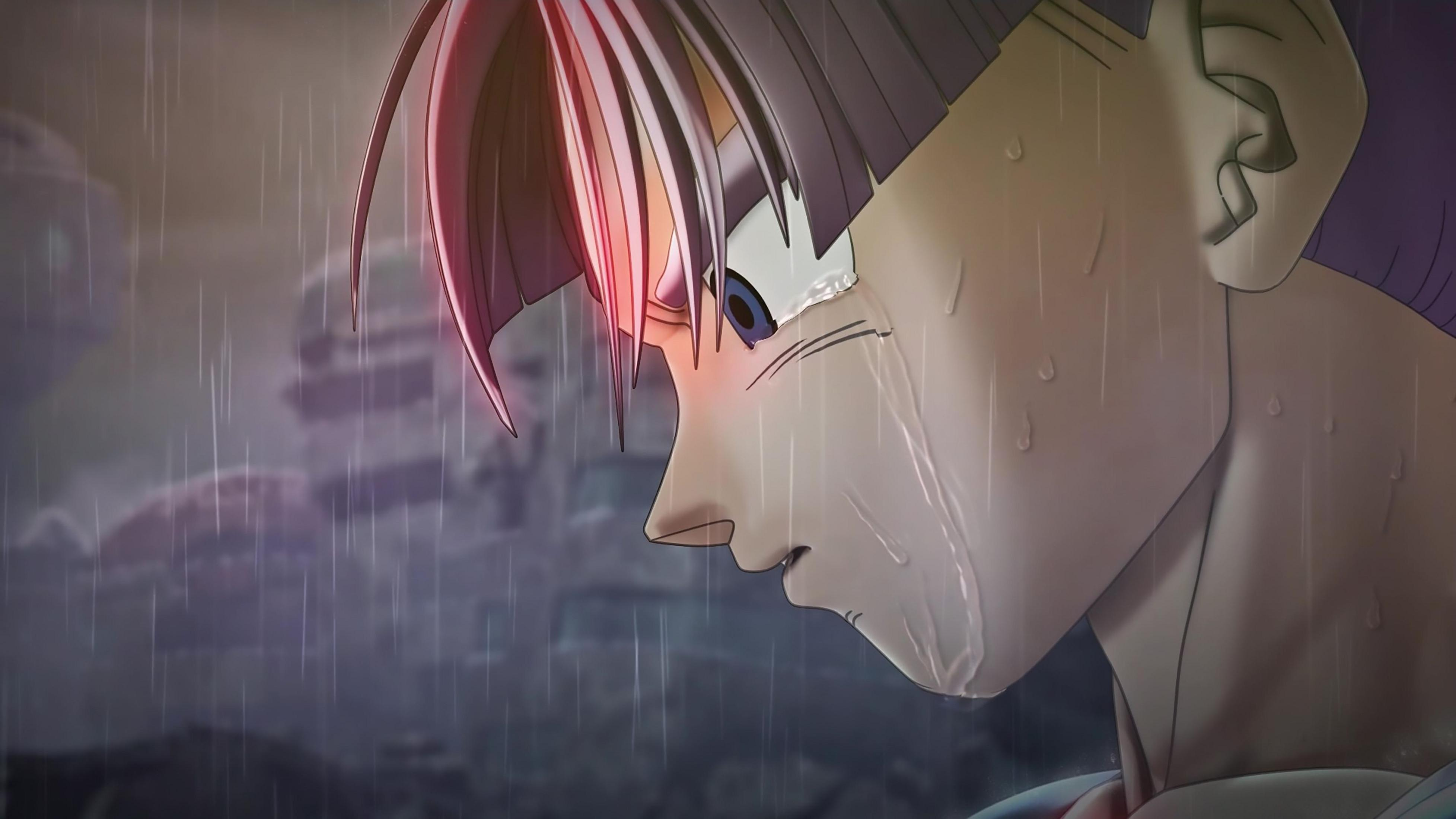 Ein Anime-Charakter weint im Regen, sein Gesicht ist schmutzig.