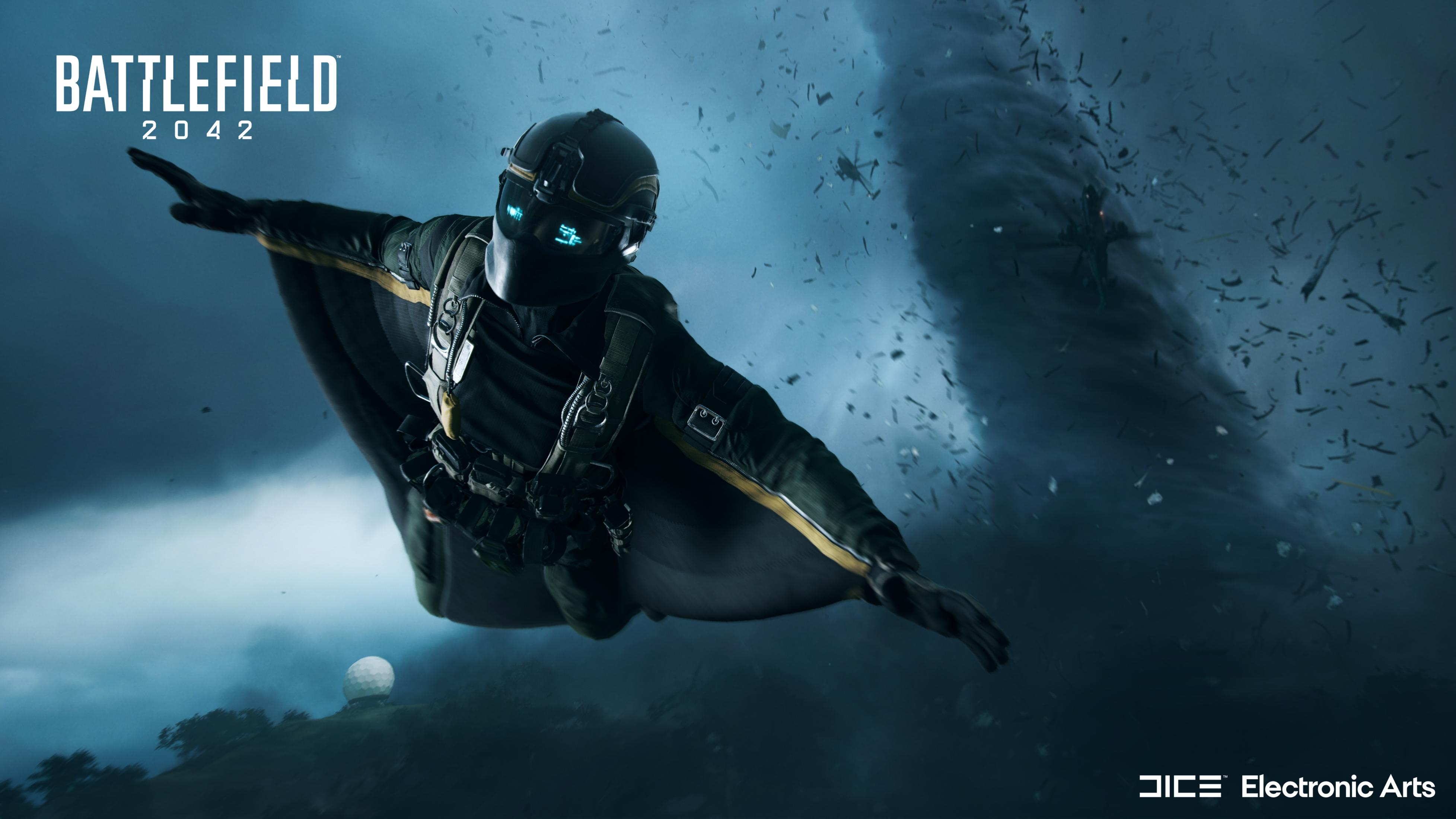 Ein Mann im Wingsuit fliegt vor einem Tornado, im Hintergrund Trümmer und ein Helikopter.
