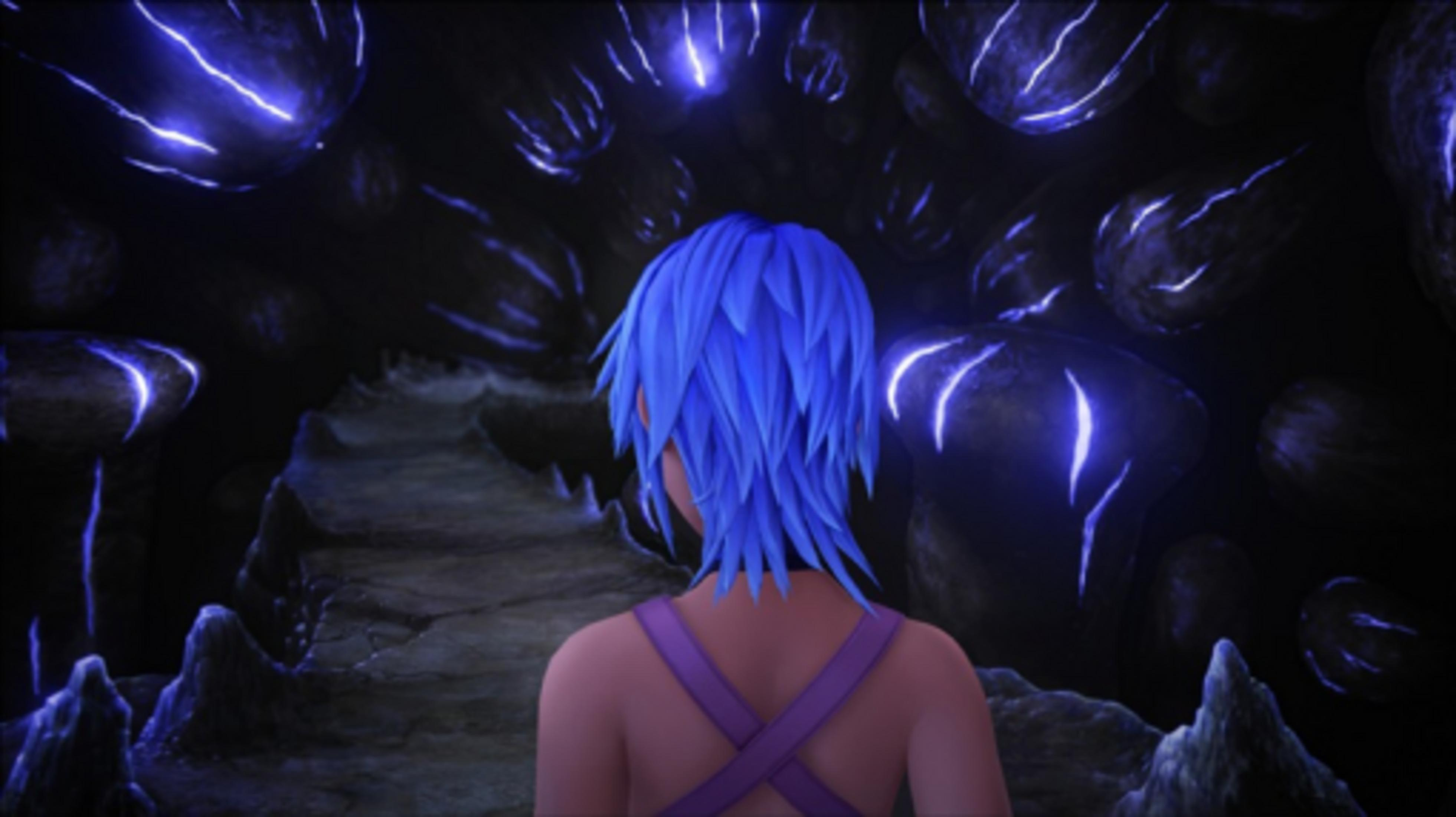 Une personne aux cheveux bleus se tient devant une grotte aux formations violettes brillantes.