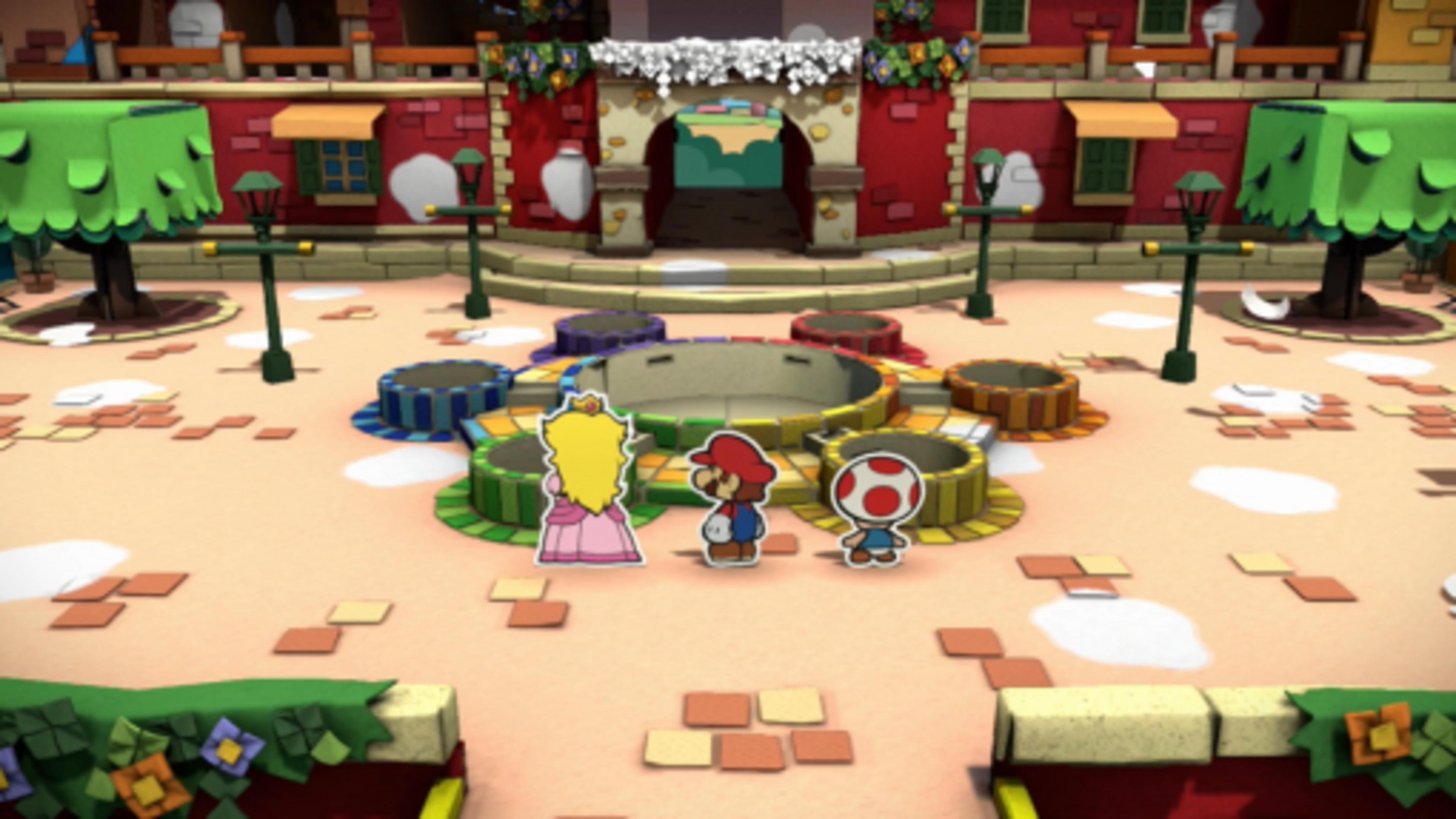 Peach, Mario i Toad stoją na placu przed budynkiem z drzewami.